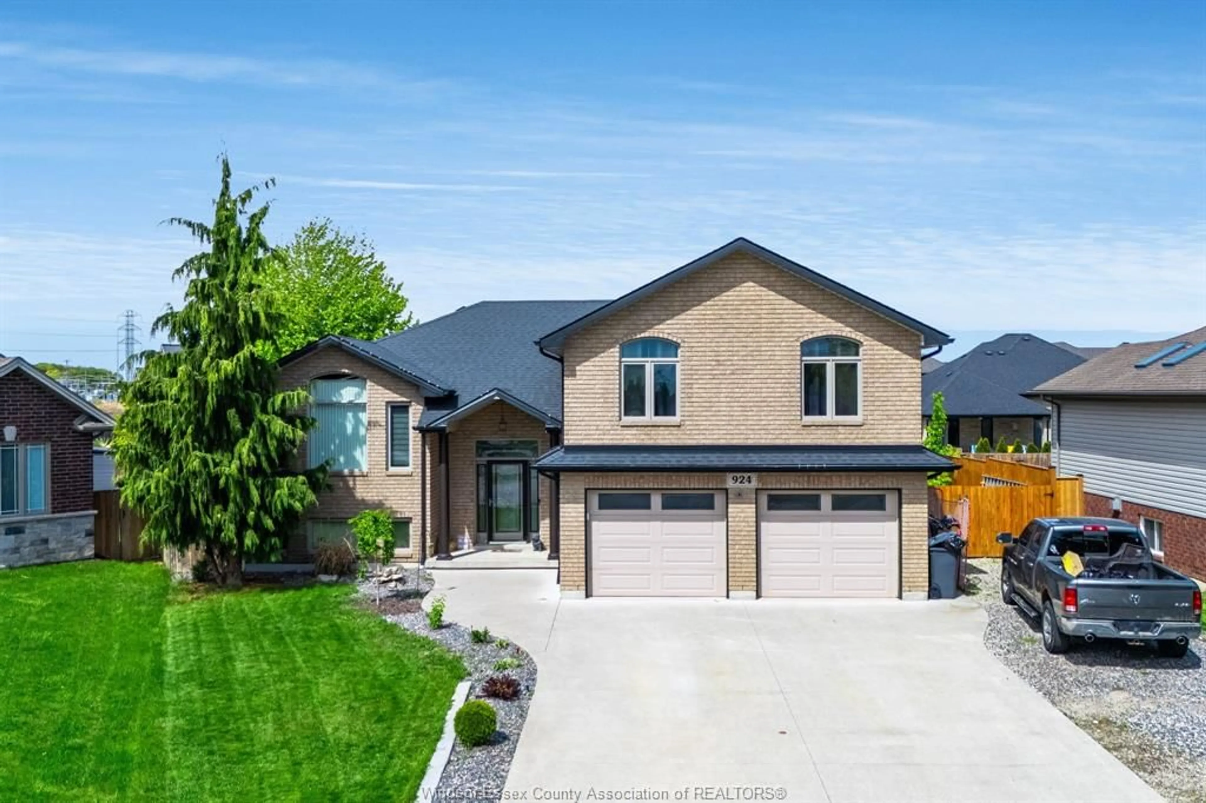 Home with brick exterior material, street for 924 Driftwood Cres, Lakeshore Ontario N0R 1A0