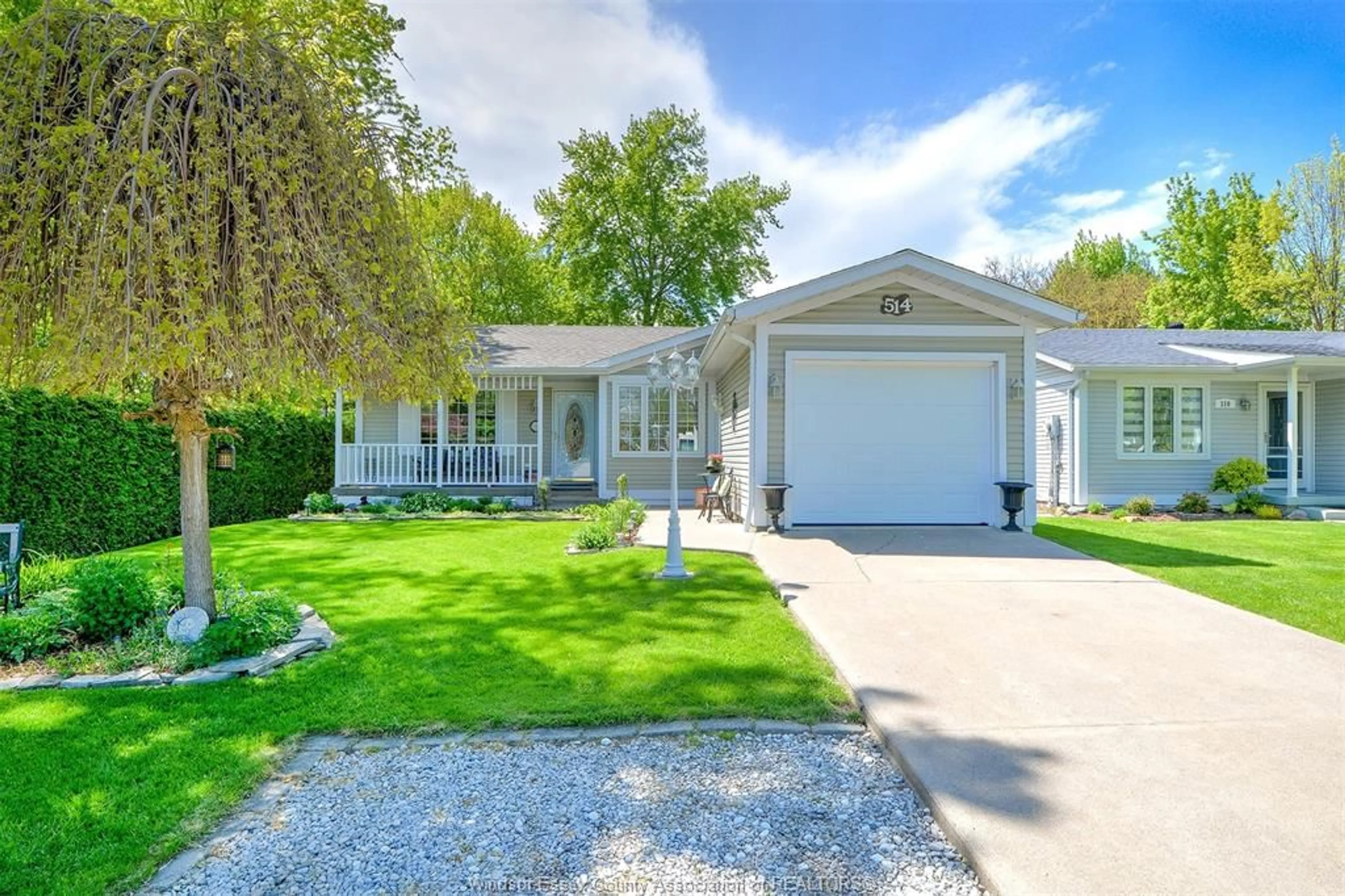 Home with vinyl exterior material, street for 514 HALO Cres, Belle River Ontario N0R 1A0