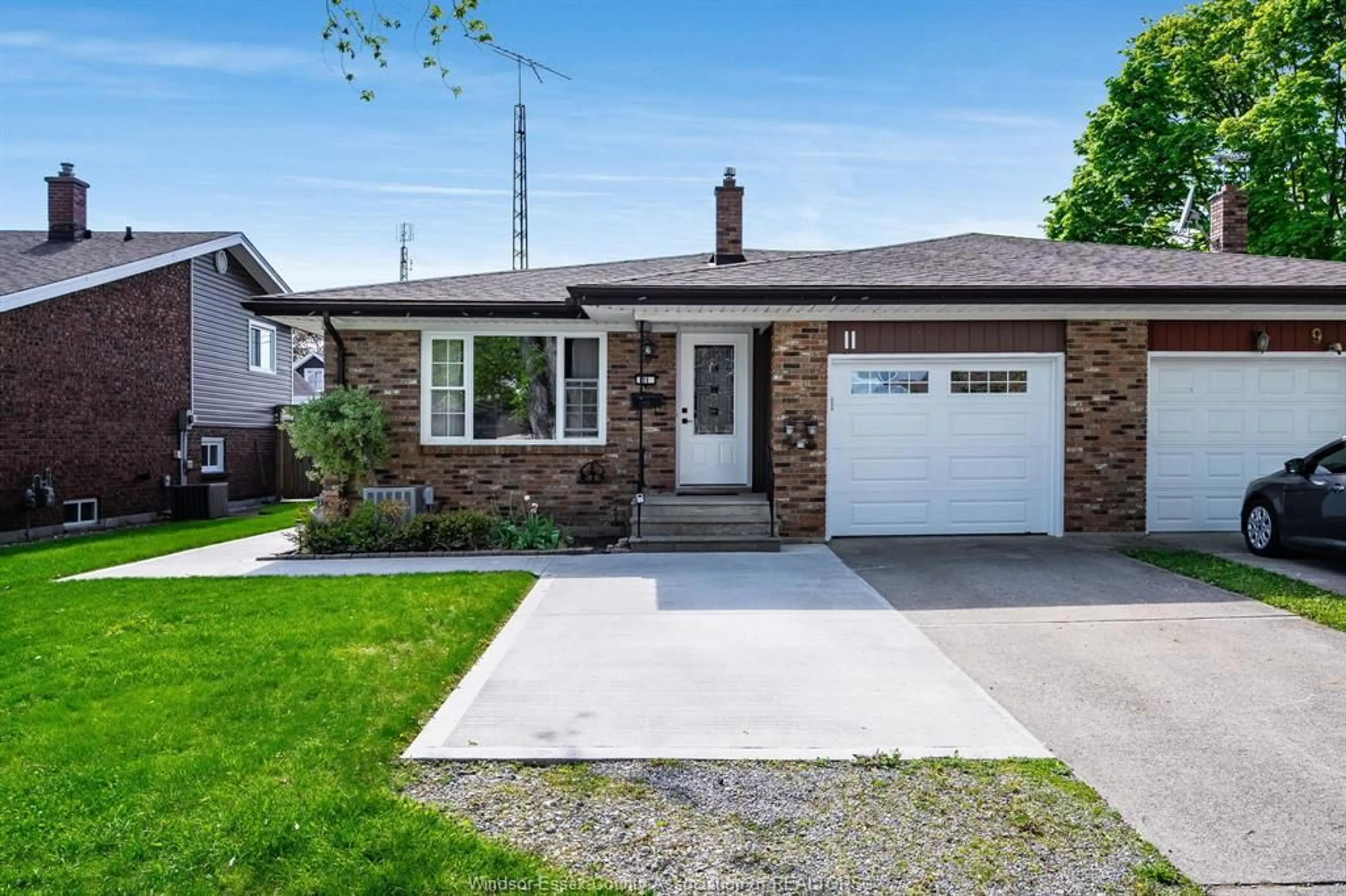 Home with brick exterior material, street for 11 Lutsch St, Leamington Ontario N8H 4K3