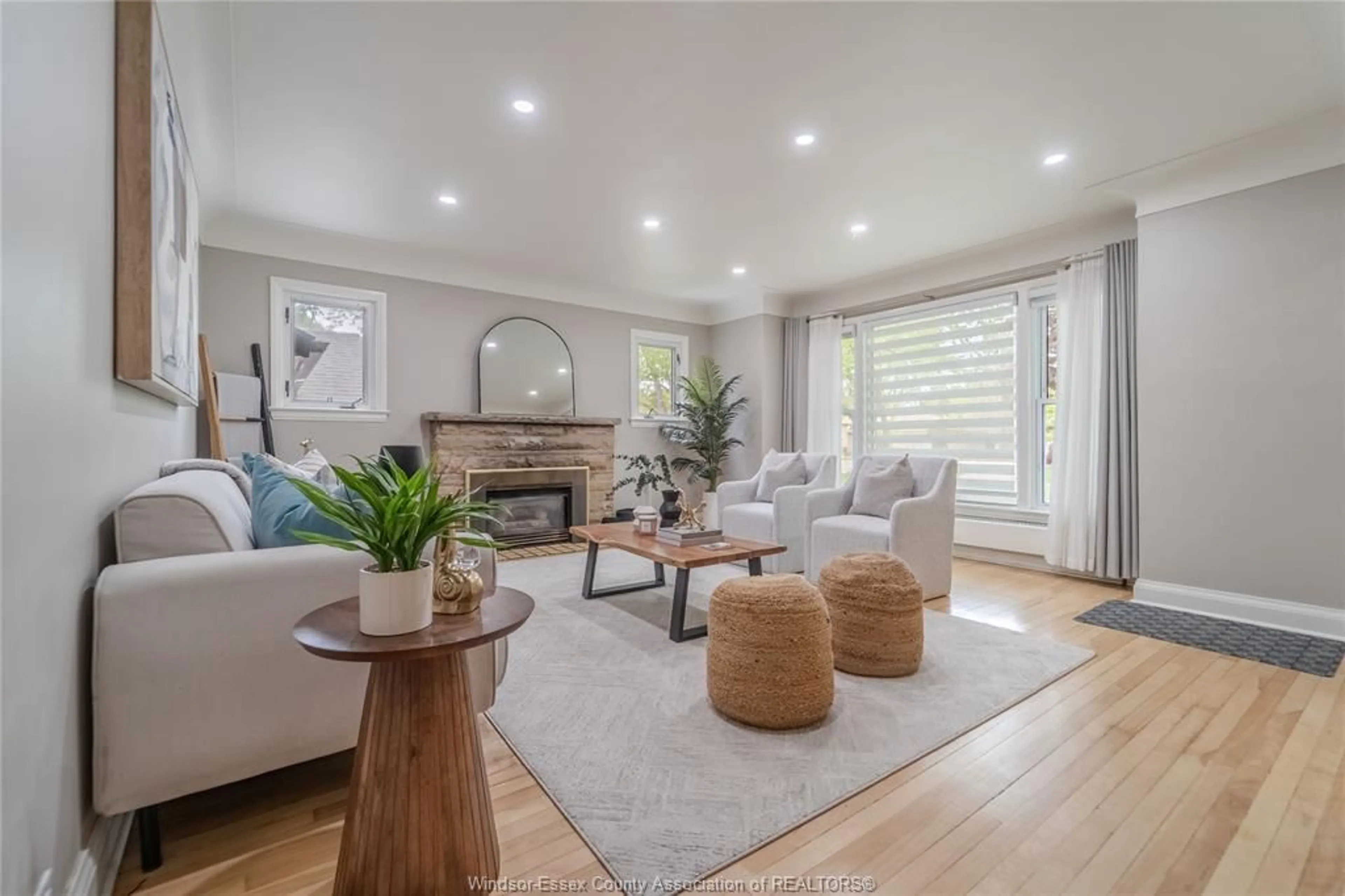 Living room with furniture, wood/laminate floor for 2458 Buckingham Dr, Windsor Ontario N8T 2B5