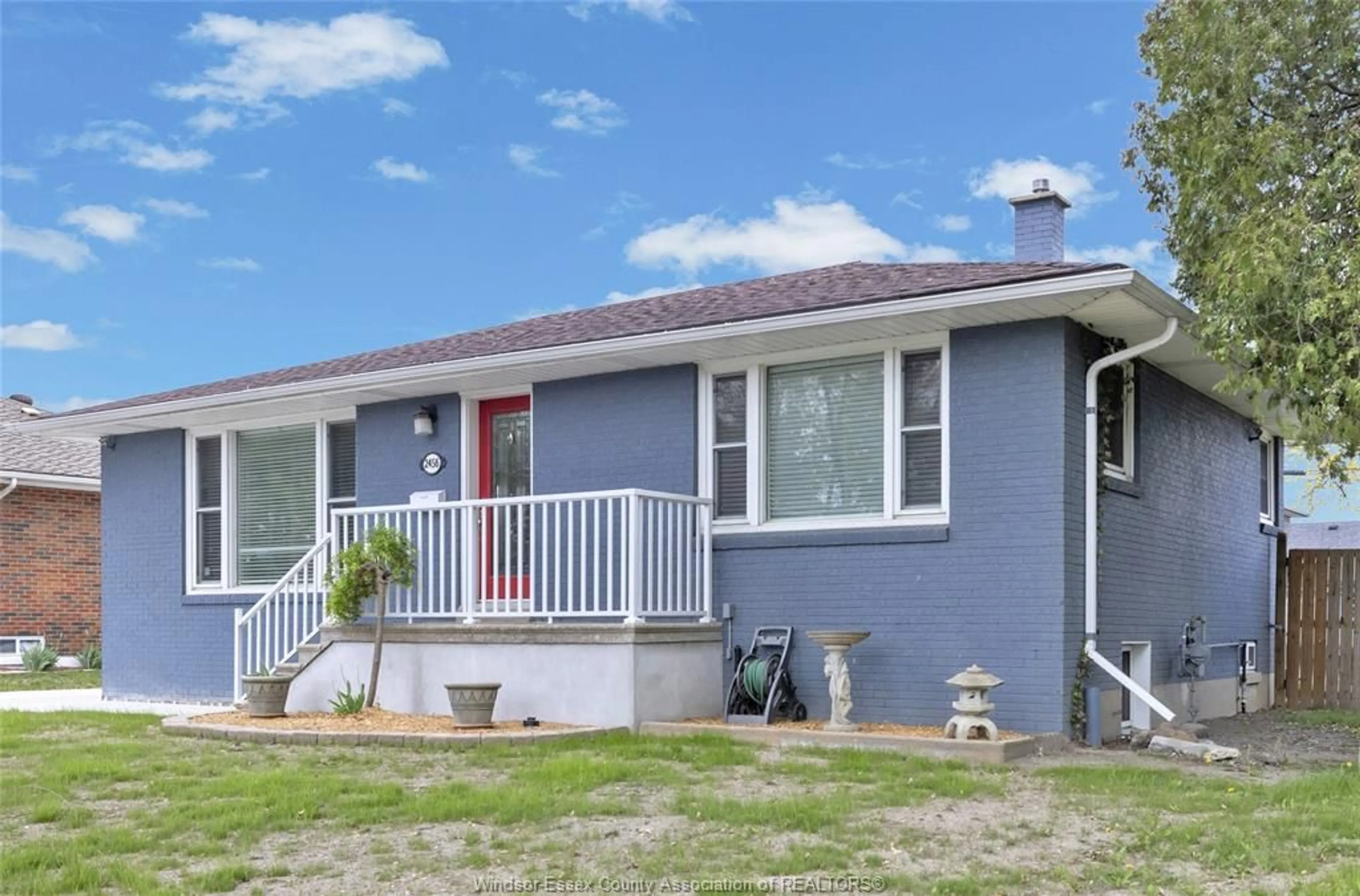 Home with vinyl exterior material, street for 2456 RANDOLPH, Windsor Ontario N9E 3C7