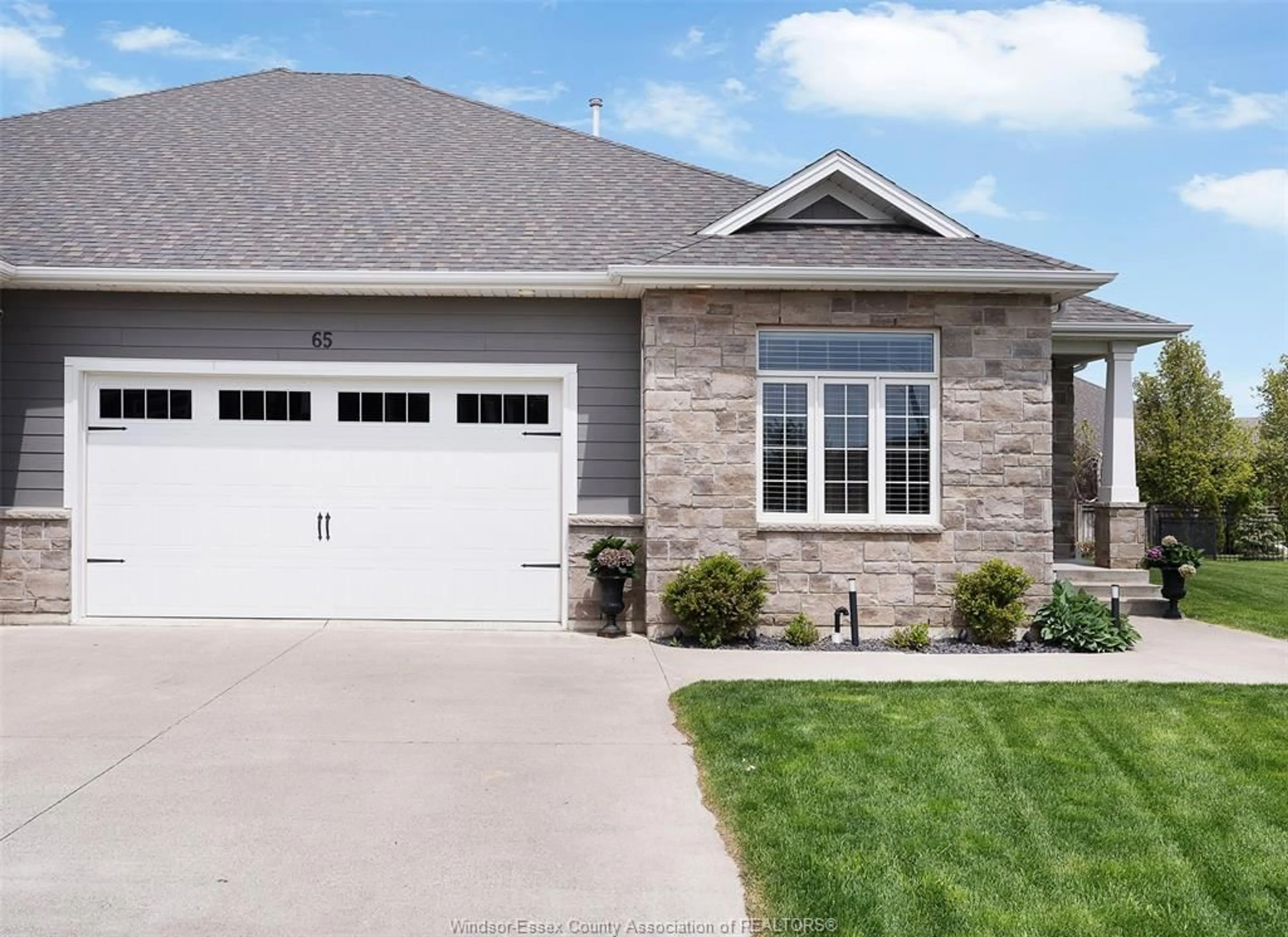 Home with brick exterior material, street for 65 ROBIN Crt, Kingsville Ontario N9Y 0E1