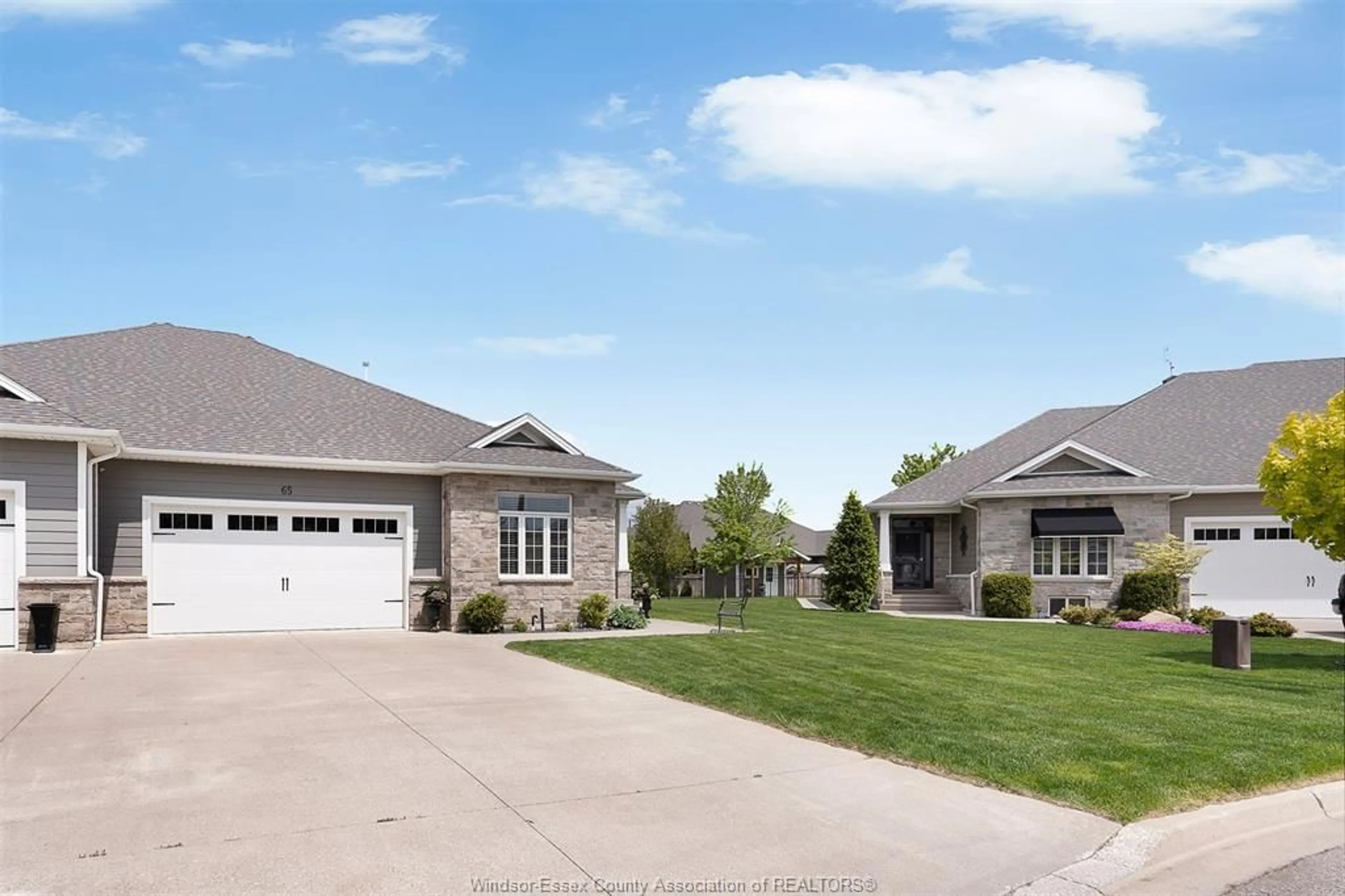 Home with vinyl exterior material, street for 65 ROBIN Crt, Kingsville Ontario N9Y 0E1