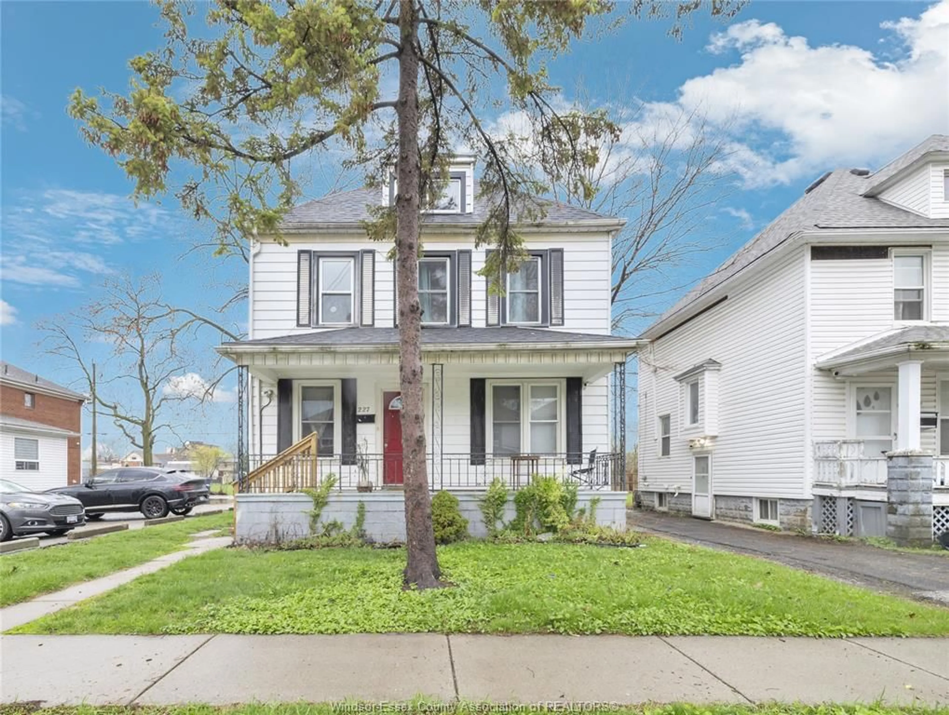 Home with vinyl exterior material, street for 227 Bridge Ave, Windsor Ontario N9B 2M1