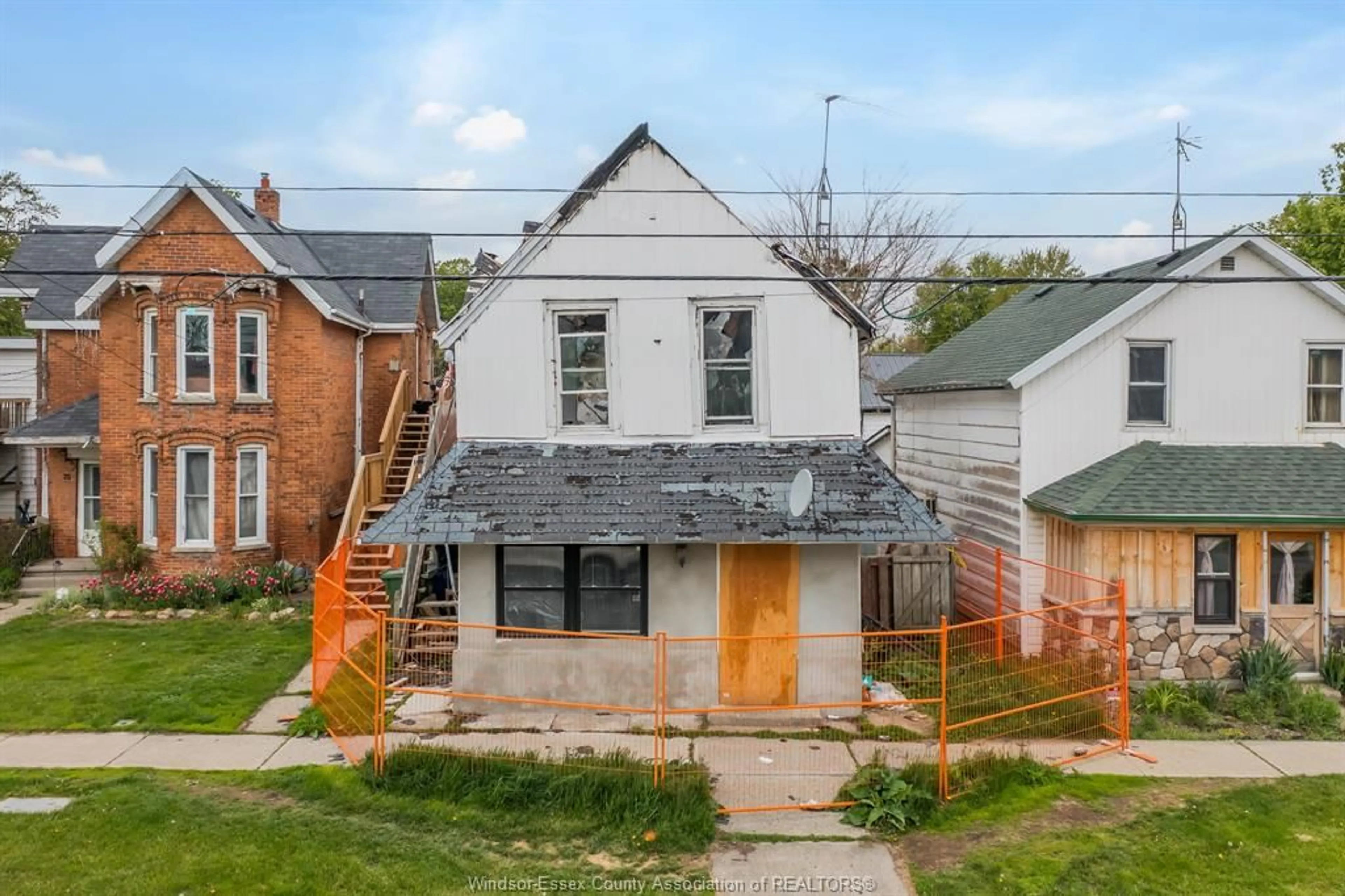 A pic from outside/outdoor area/front of a property/back of a property/a pic from drone, street for 83 TALBOT St, Blenheim Ontario N0P 1A0