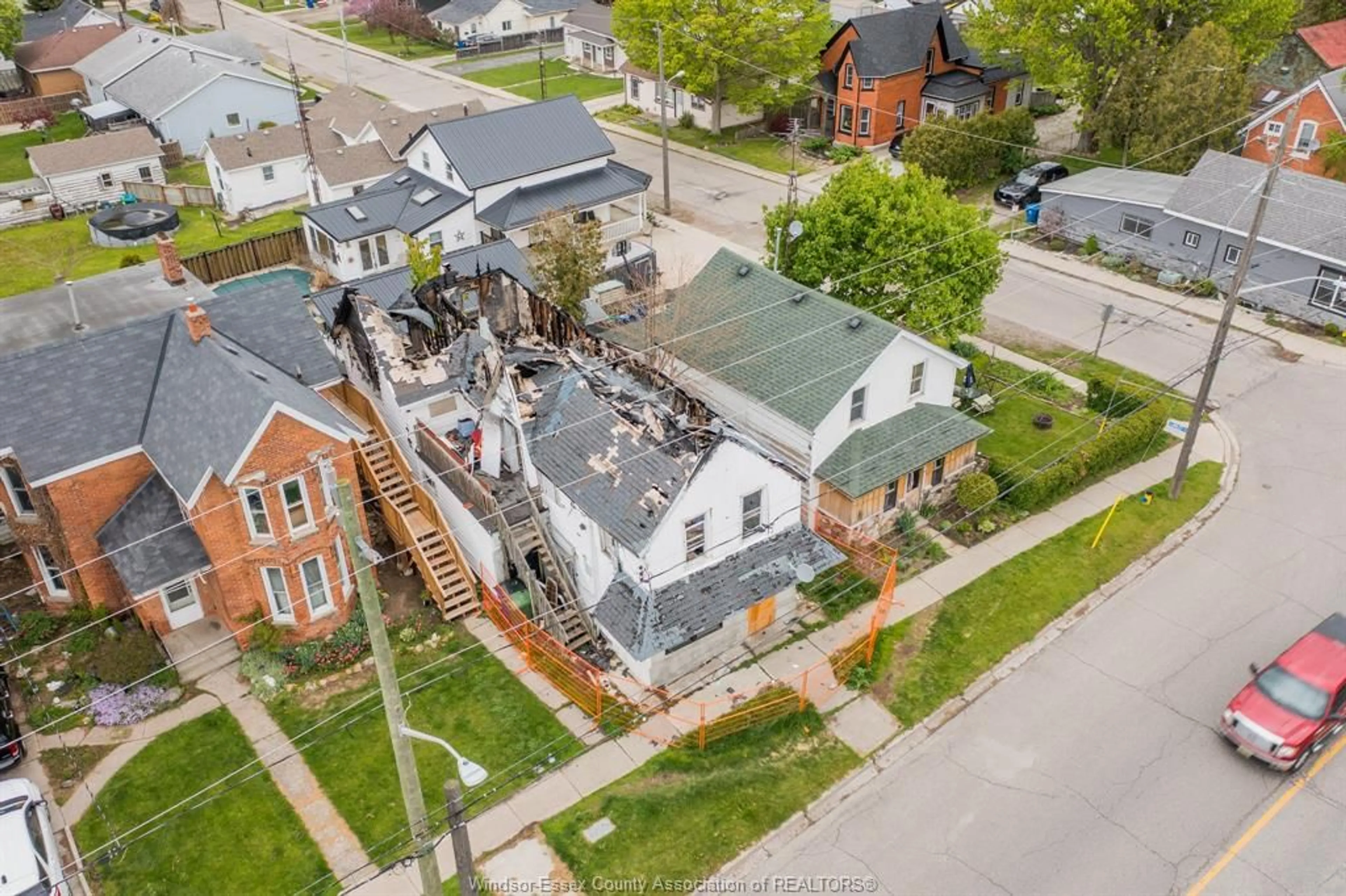 A pic from outside/outdoor area/front of a property/back of a property/a pic from drone, unknown for 83 TALBOT St, Blenheim Ontario N0P 1A0