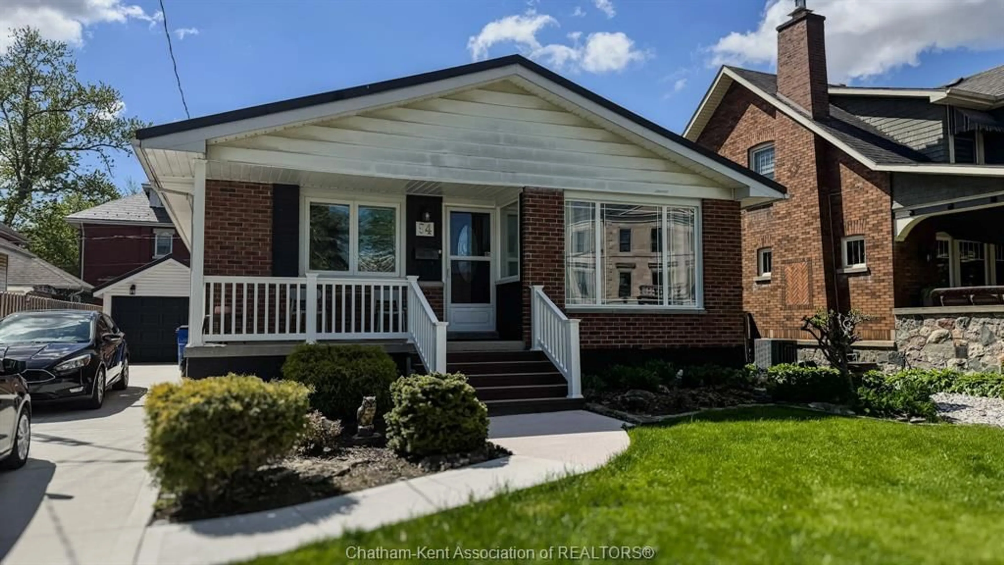 Home with brick exterior material, street for 94 Stanley Blvd, Chatham Ontario N7M 3J3