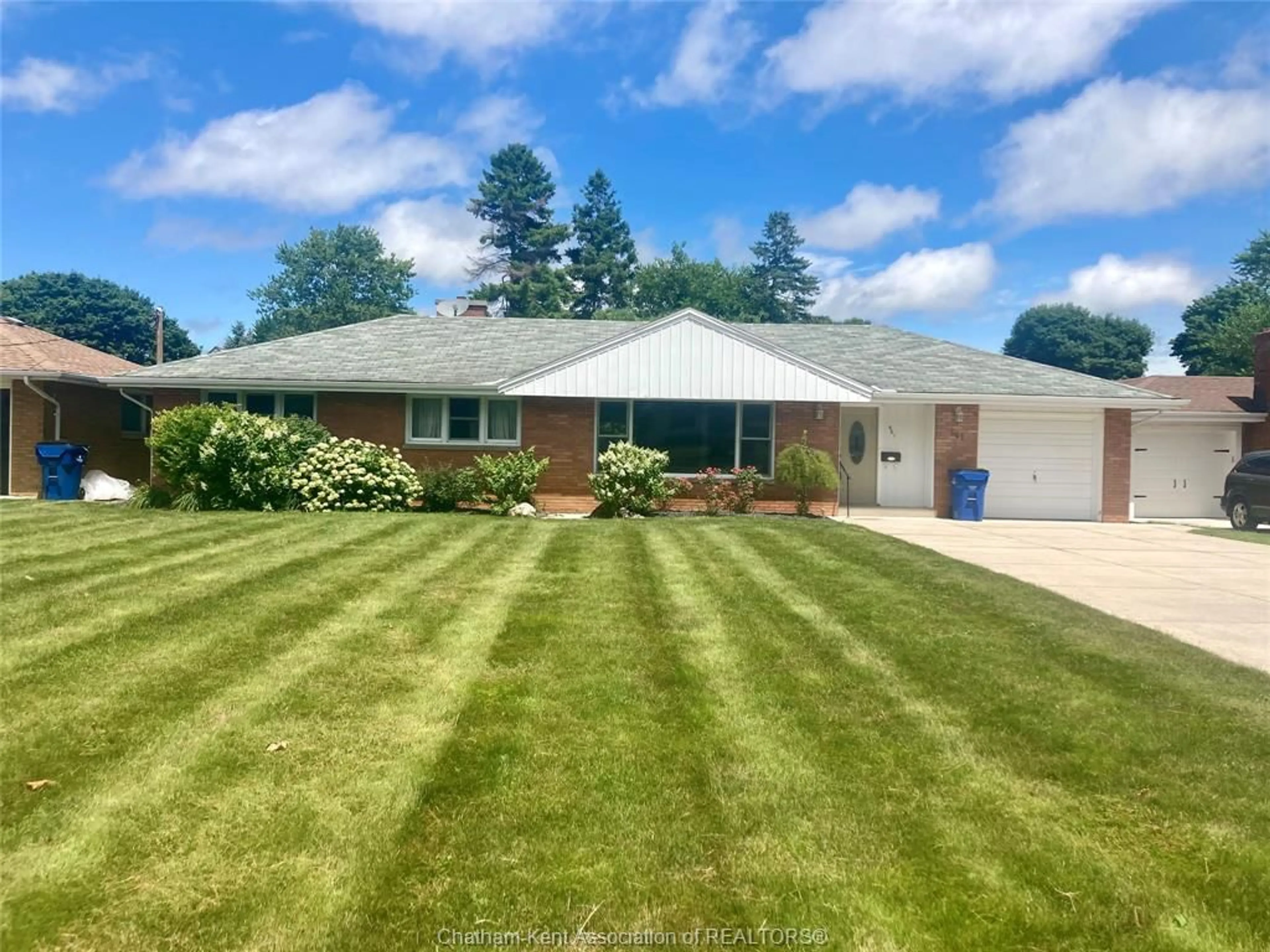A pic from outside/outdoor area/front of a property/back of a property/a pic from drone, street for 561 Lacroix St, Chatham Ontario N7M 2X3
