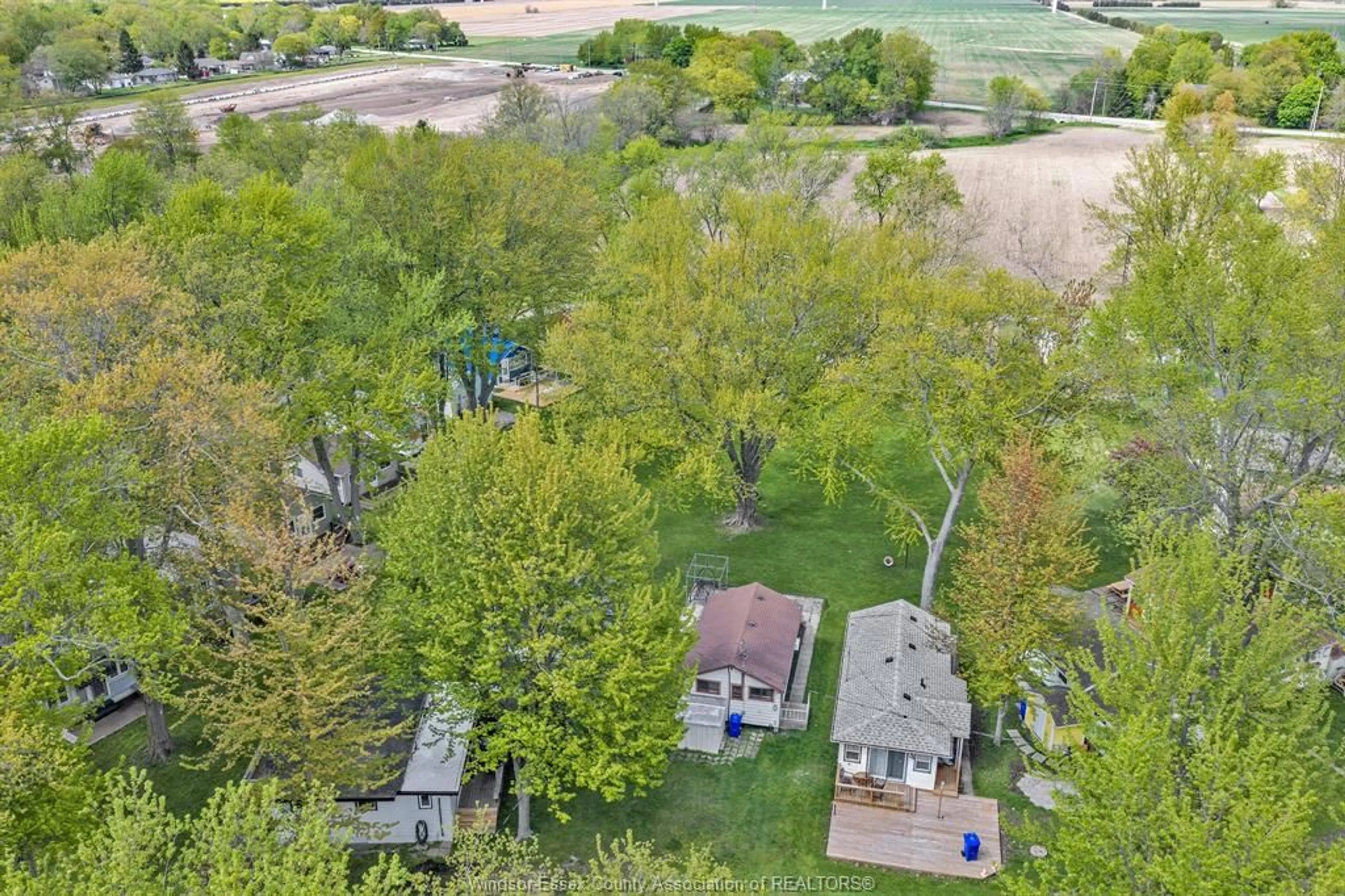 A pic from outside/outdoor area/front of a property/back of a property/a pic from drone, forest/trees view for 126 PLEASURE BEACH, Harrow Ontario N0R 1G0