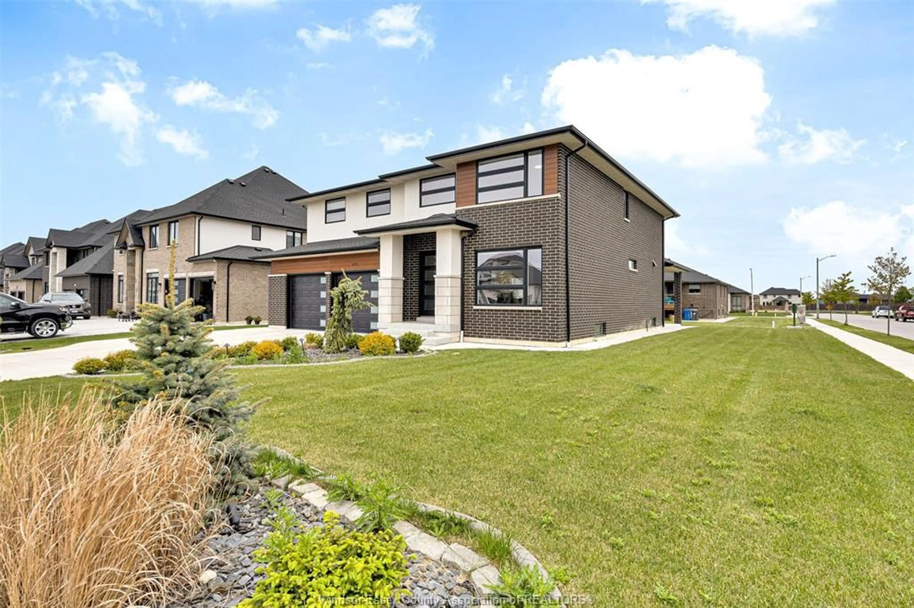 Home with brick exterior material, street for 635 MARCHE St, Lakeshore Ontario N8L 0K2