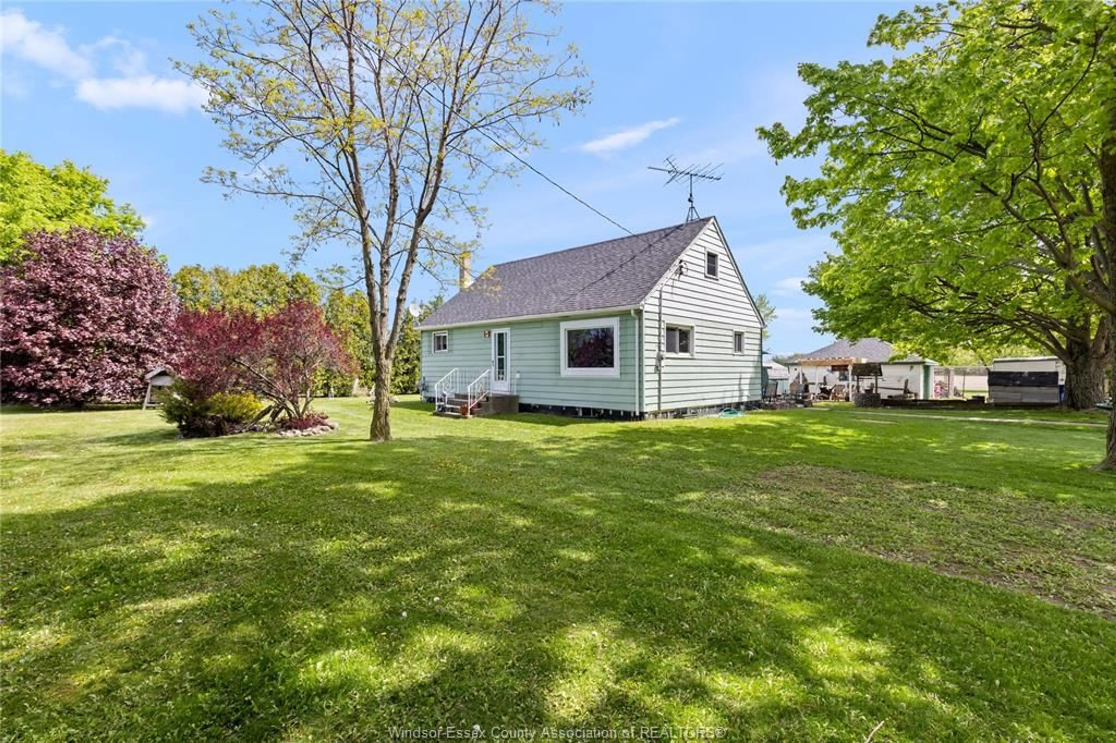 A pic from outside/outdoor area/front of a property/back of a property/a pic from drone, water/lake/river/ocean view for 1224 LAKESHORE ROAD 107, Maidstone Ontario N8X 2X7