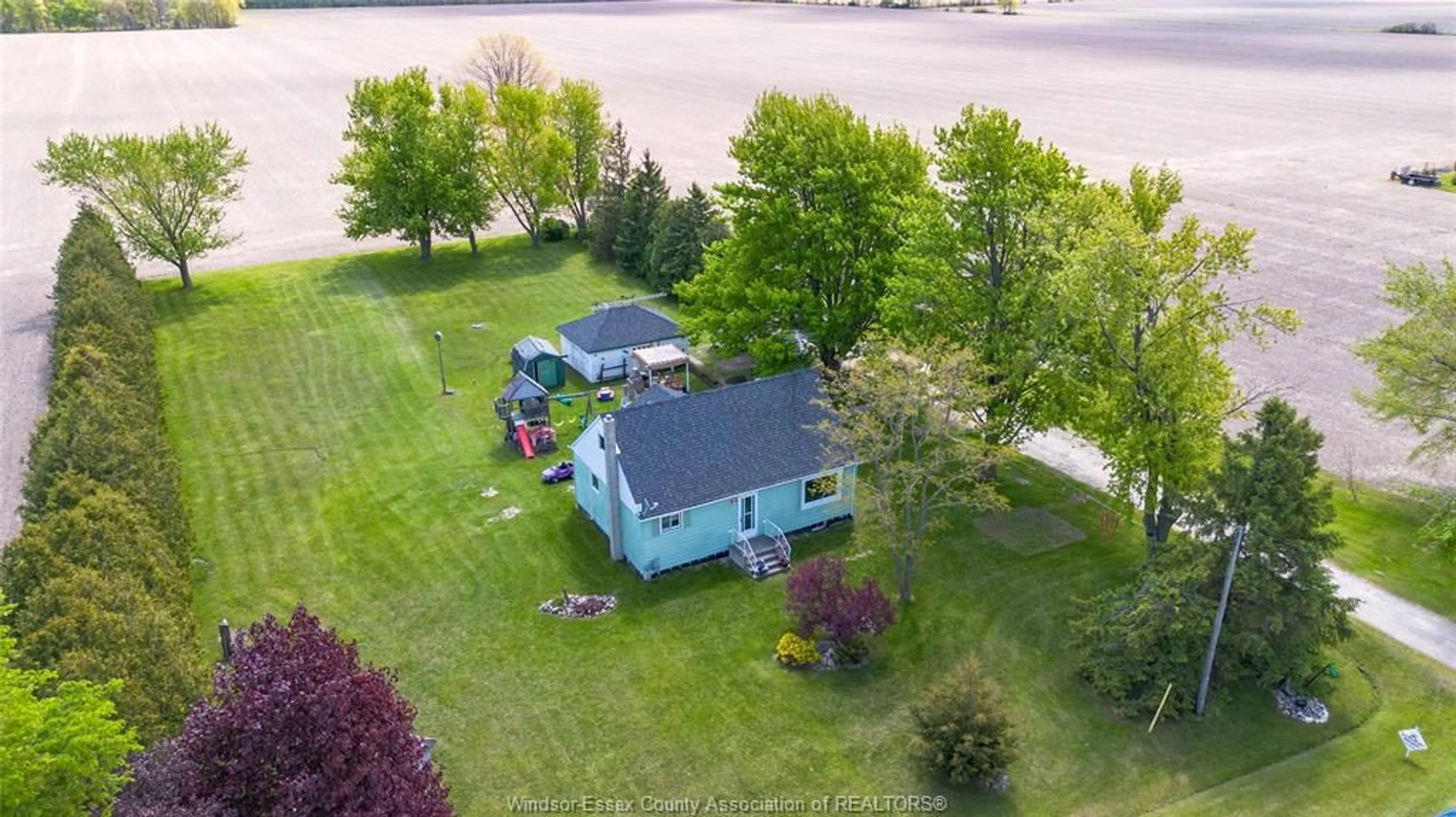 A pic from outside/outdoor area/front of a property/back of a property/a pic from drone, water/lake/river/ocean view for 1224 LAKESHORE ROAD 107, Maidstone Ontario N8X 2X7