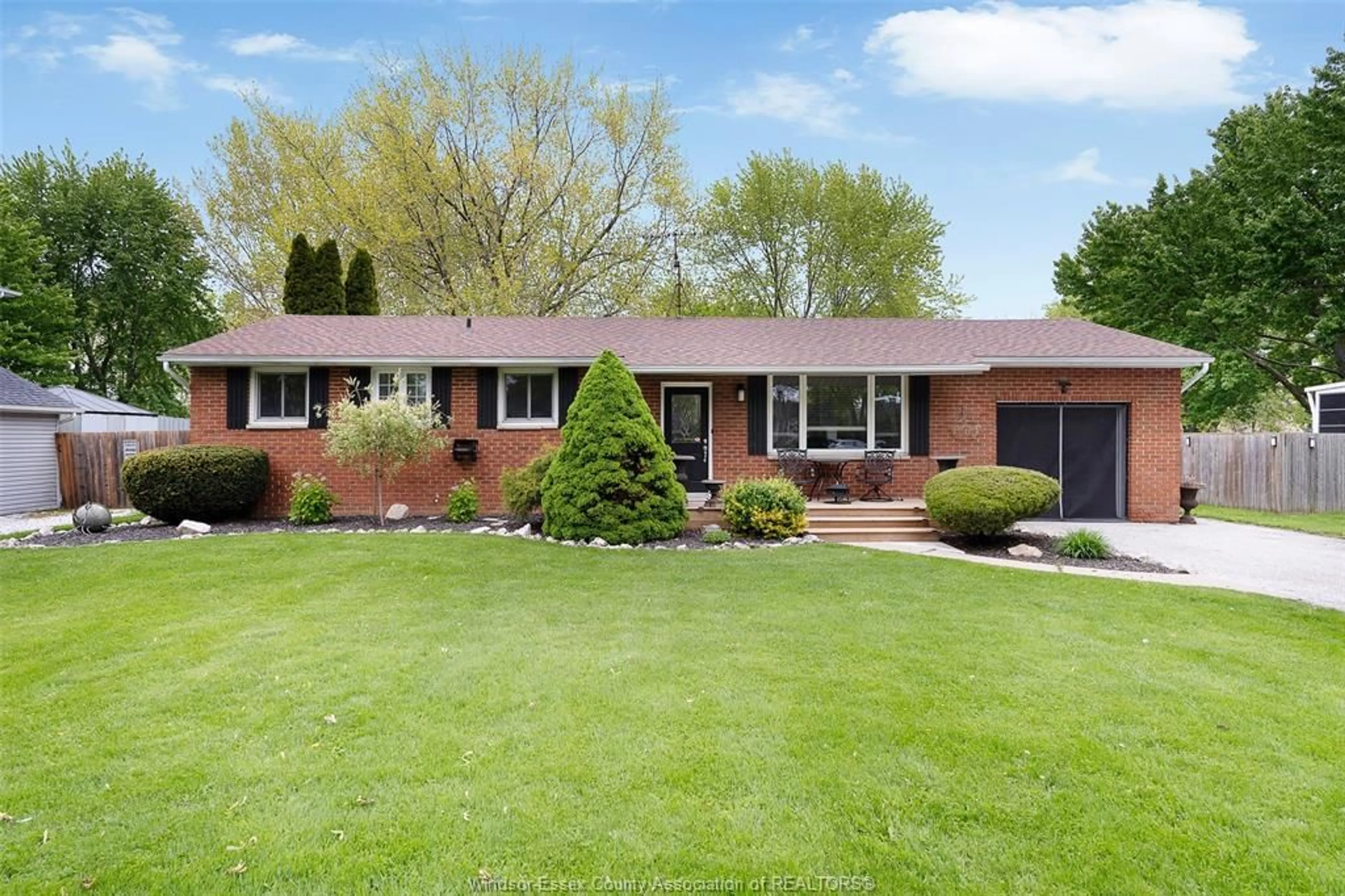 Home with brick exterior material, street for 653 OPTIMIST, Lakeshore Ontario N8L 0J6