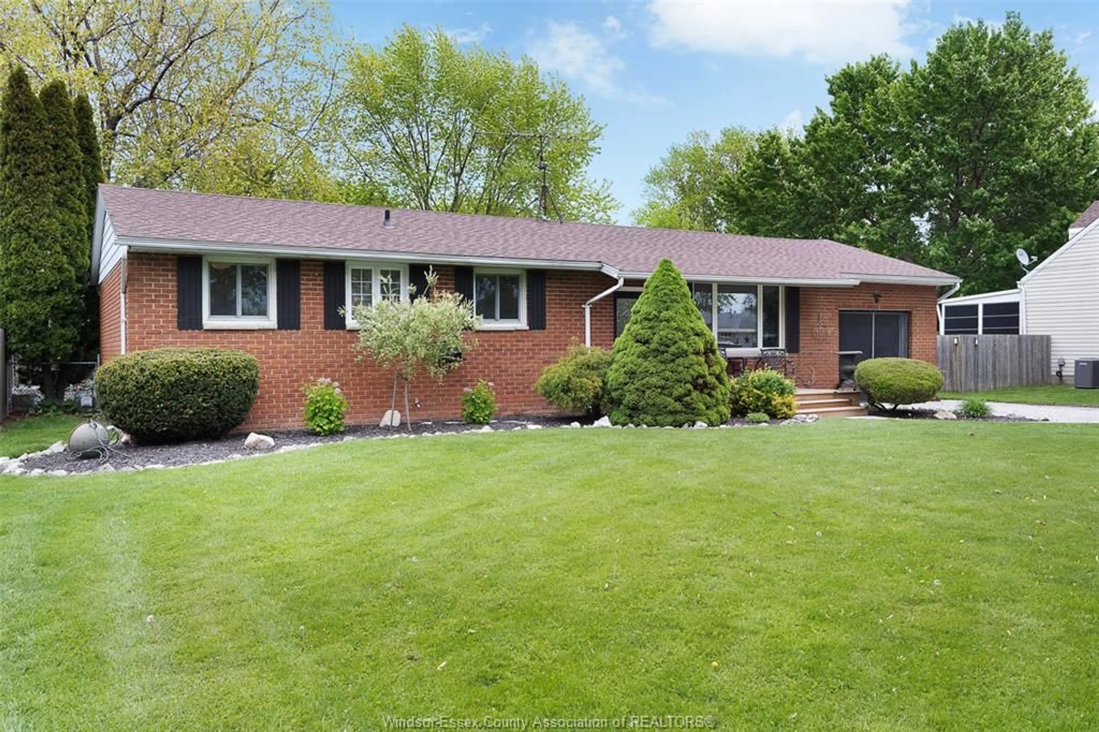 Home with brick exterior material, street for 653 OPTIMIST, Lakeshore Ontario N8L 0J6