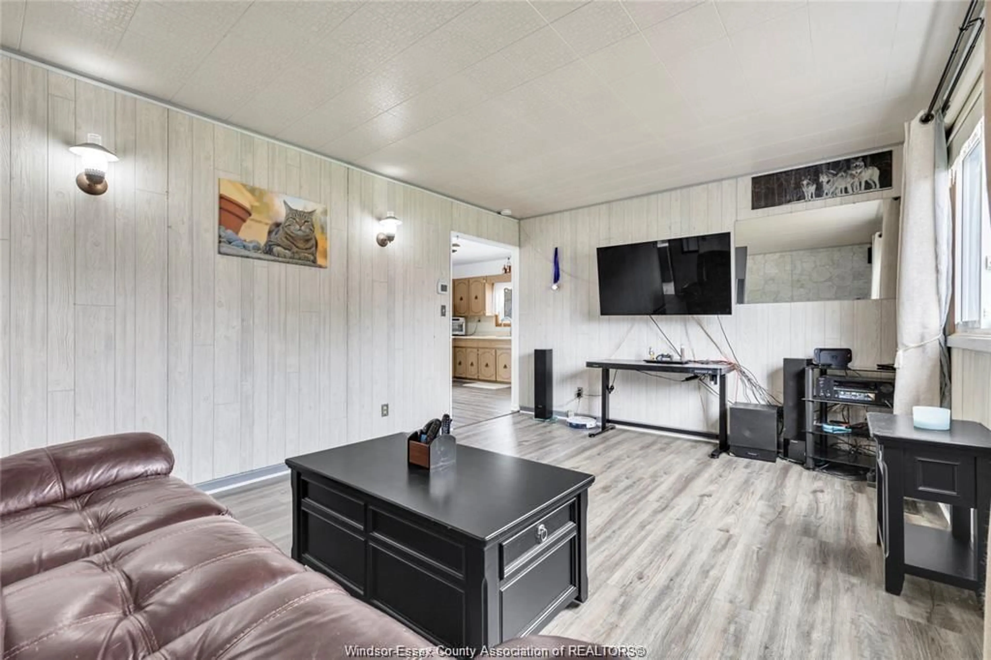 Living room with furniture, wood/laminate floor for 329 PARKSIDE Dr, McGregor Ontario N0R 1J0