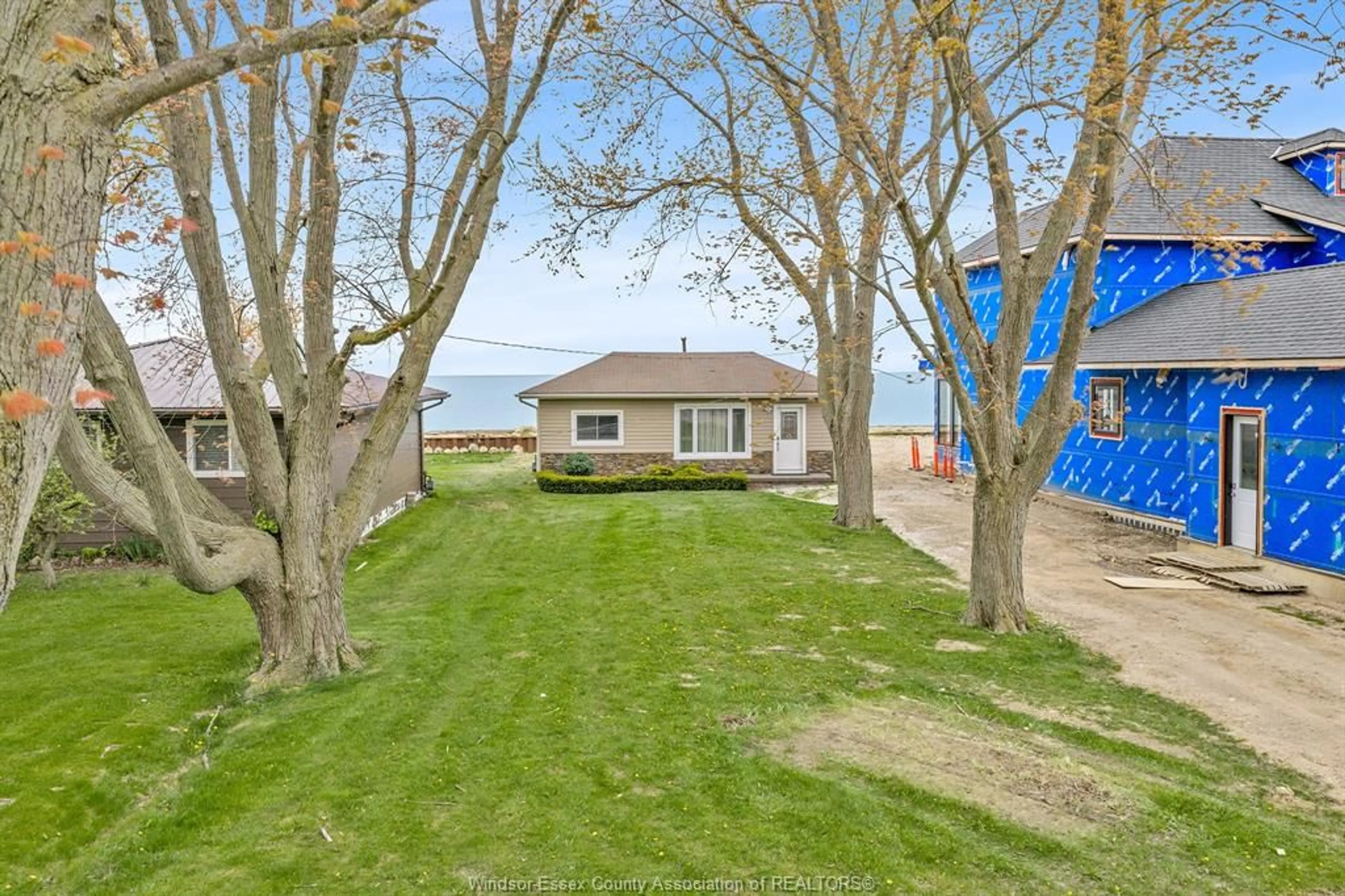 A pic from outside/outdoor area/front of a property/back of a property/a pic from drone, water/lake/river/ocean view for 162 Robson Rd, Leamington Ontario N8H 5R1
