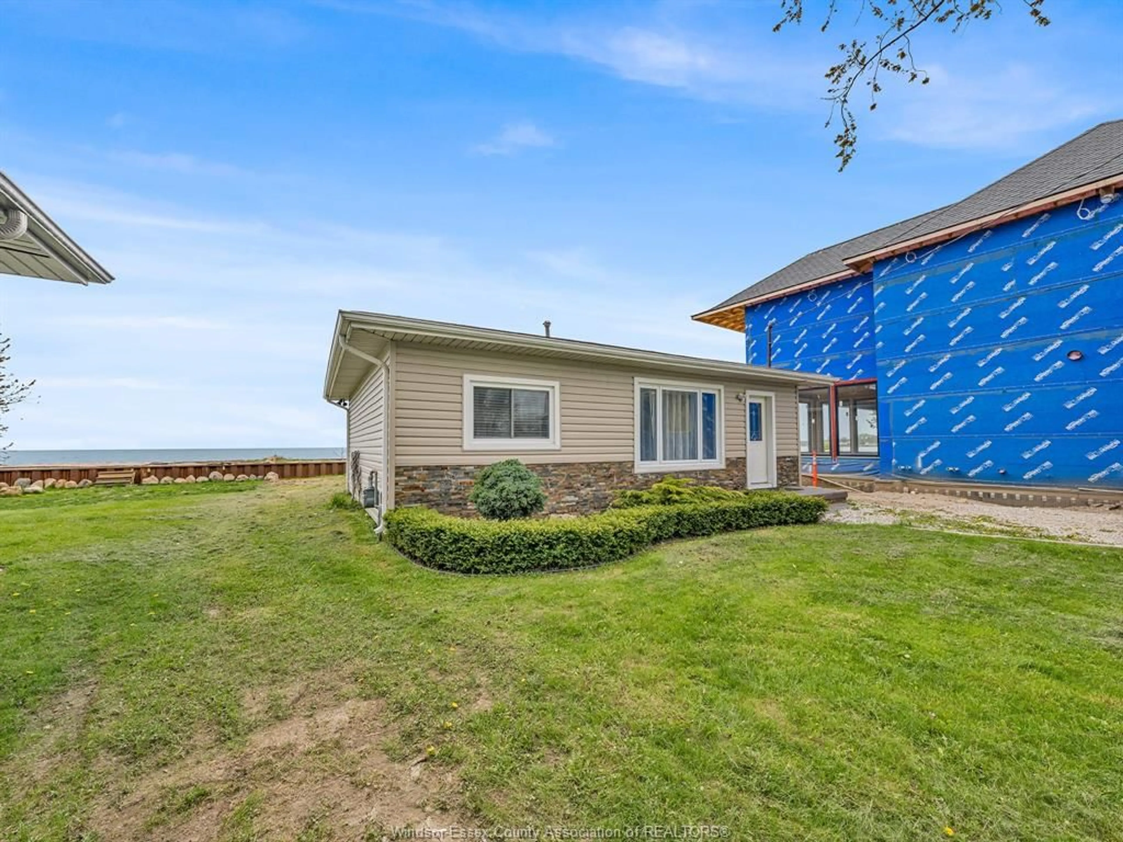 A pic from outside/outdoor area/front of a property/back of a property/a pic from drone, water/lake/river/ocean view for 162 Robson Rd, Leamington Ontario N8H 5R1