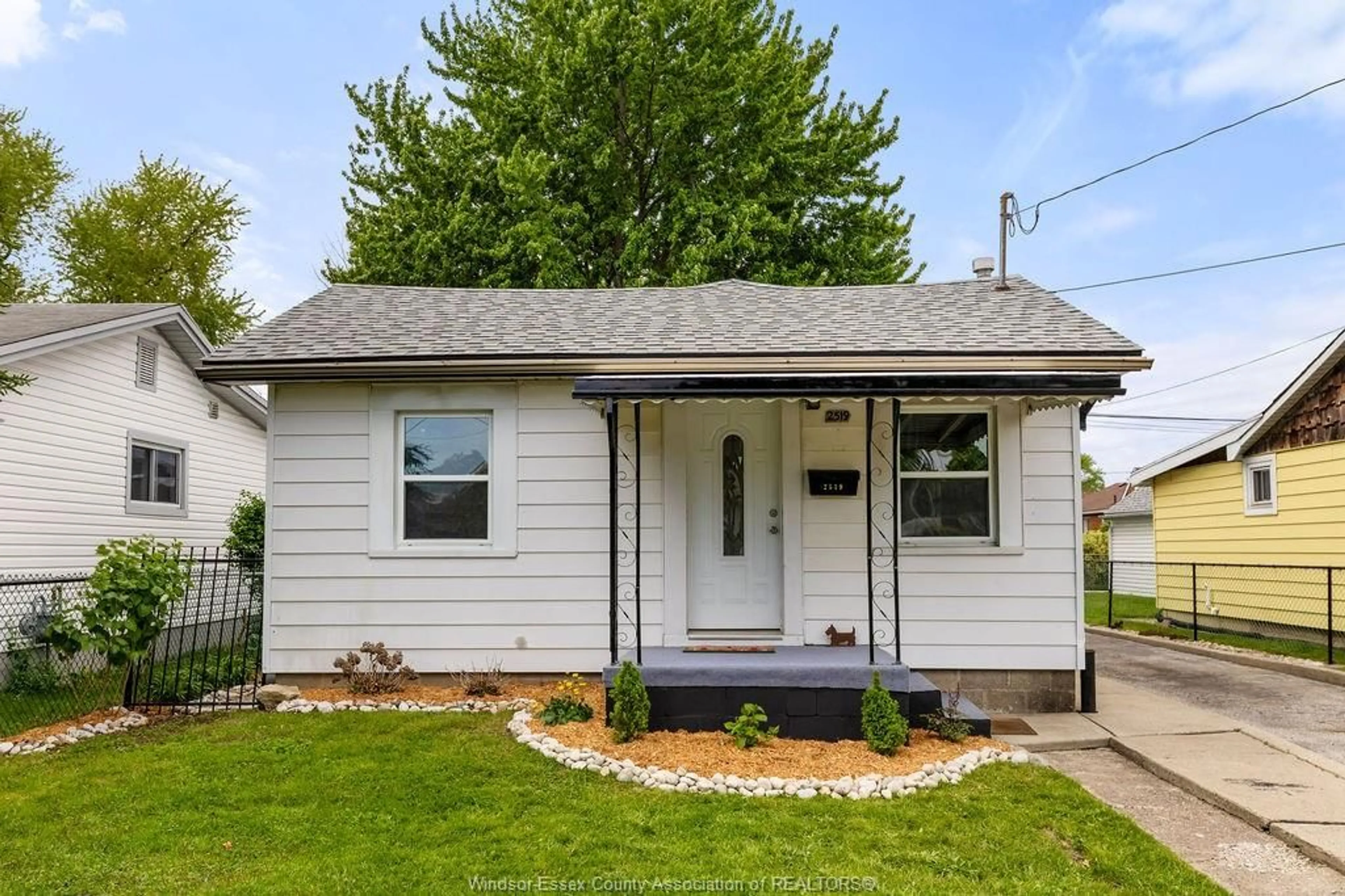 Home with vinyl exterior material, street for 2519 PILLETTE, Windsor Ontario N9N 0J3