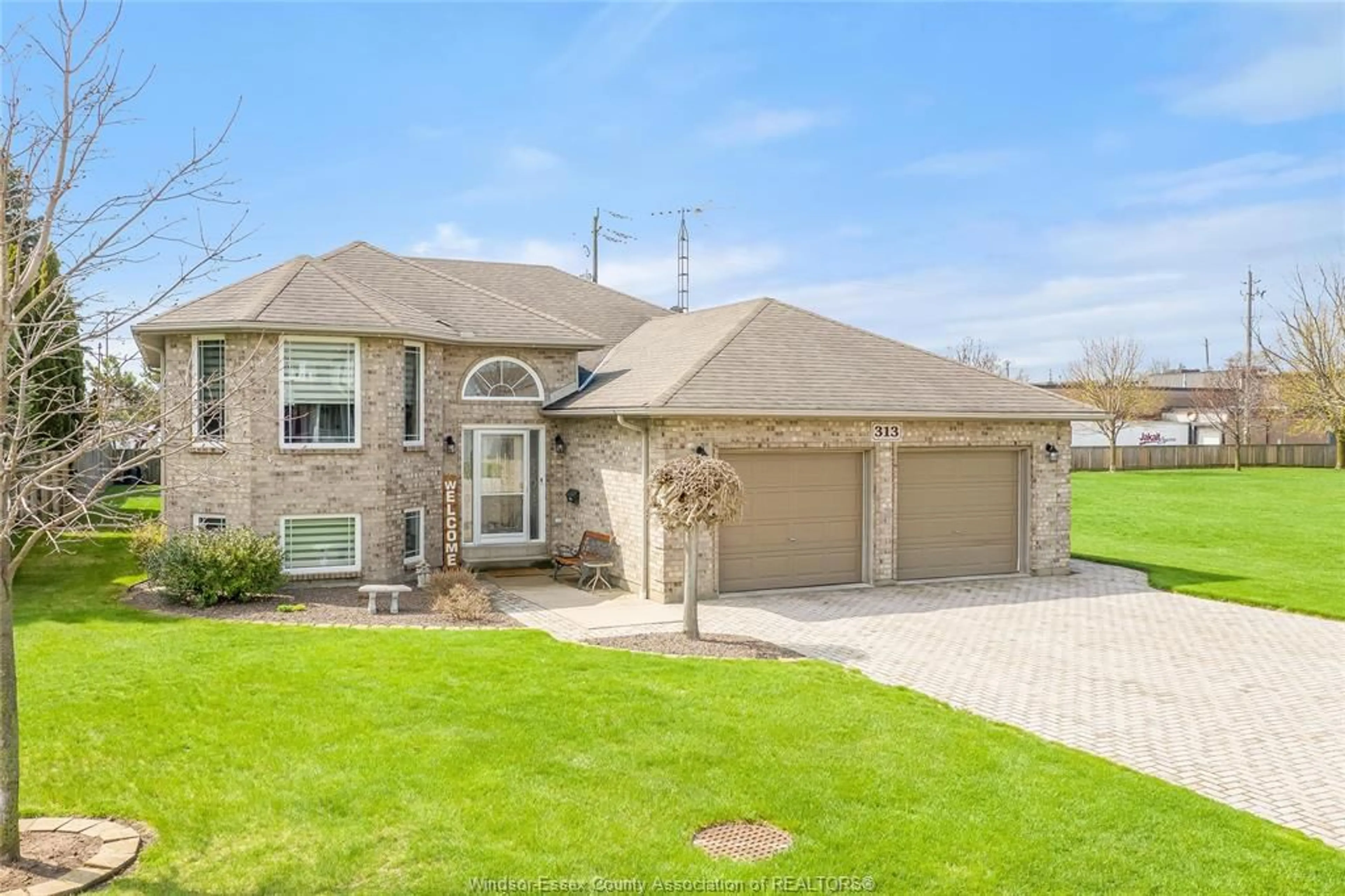 Home with brick exterior material, street for 313 APPLEWOOD, Kingsville Ontario N9Y 3Y7