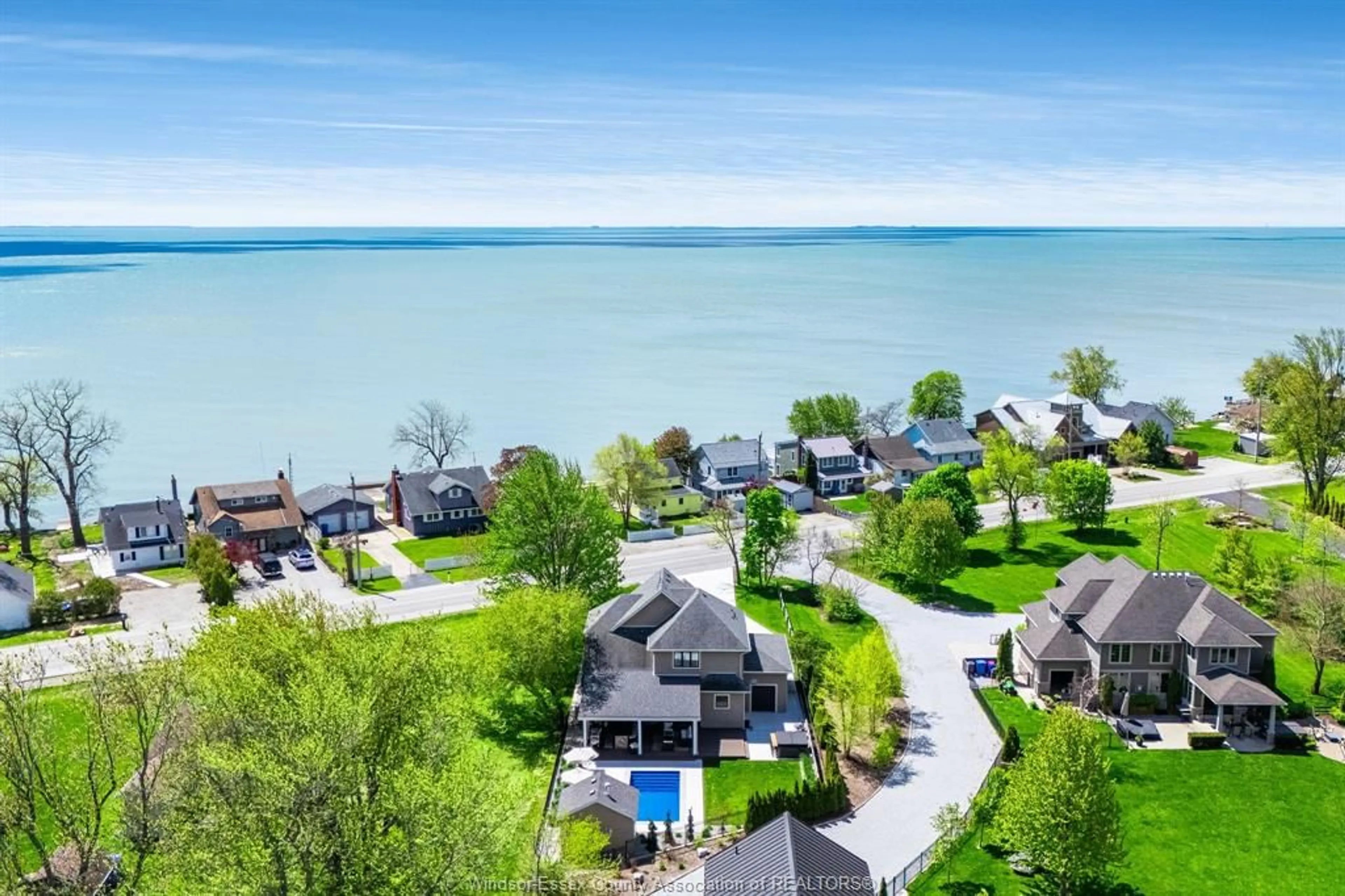 A pic from outside/outdoor area/front of a property/back of a property/a pic from drone, water/lake/river/ocean view for 1486 Heritage Rd, Kingsville Ontario N9Y 2E6