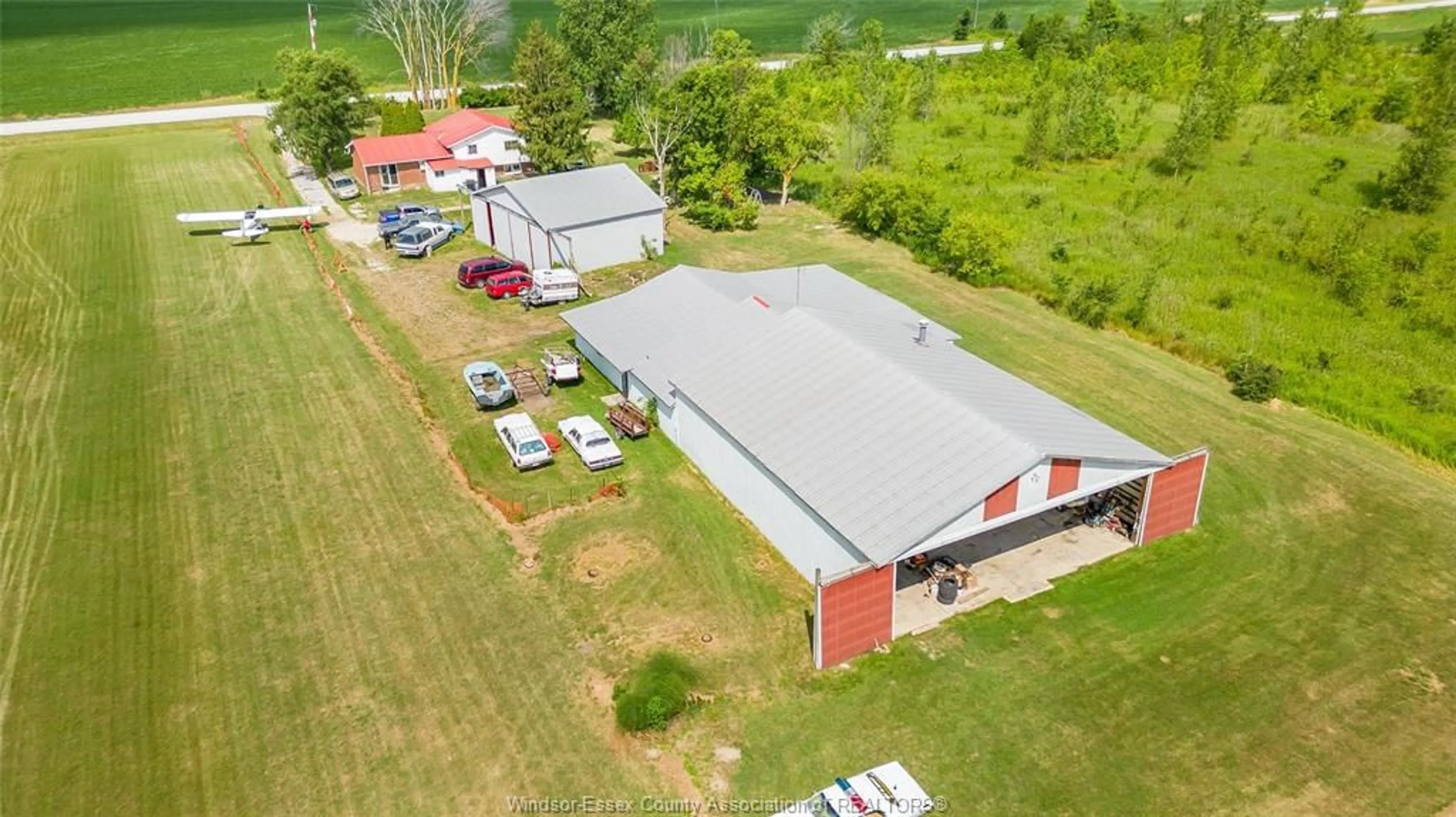 A pic from outside/outdoor area/front of a property/back of a property/a pic from drone, building for 7063 COULTER SIDE Rd, Essex Ontario N0R 1B0