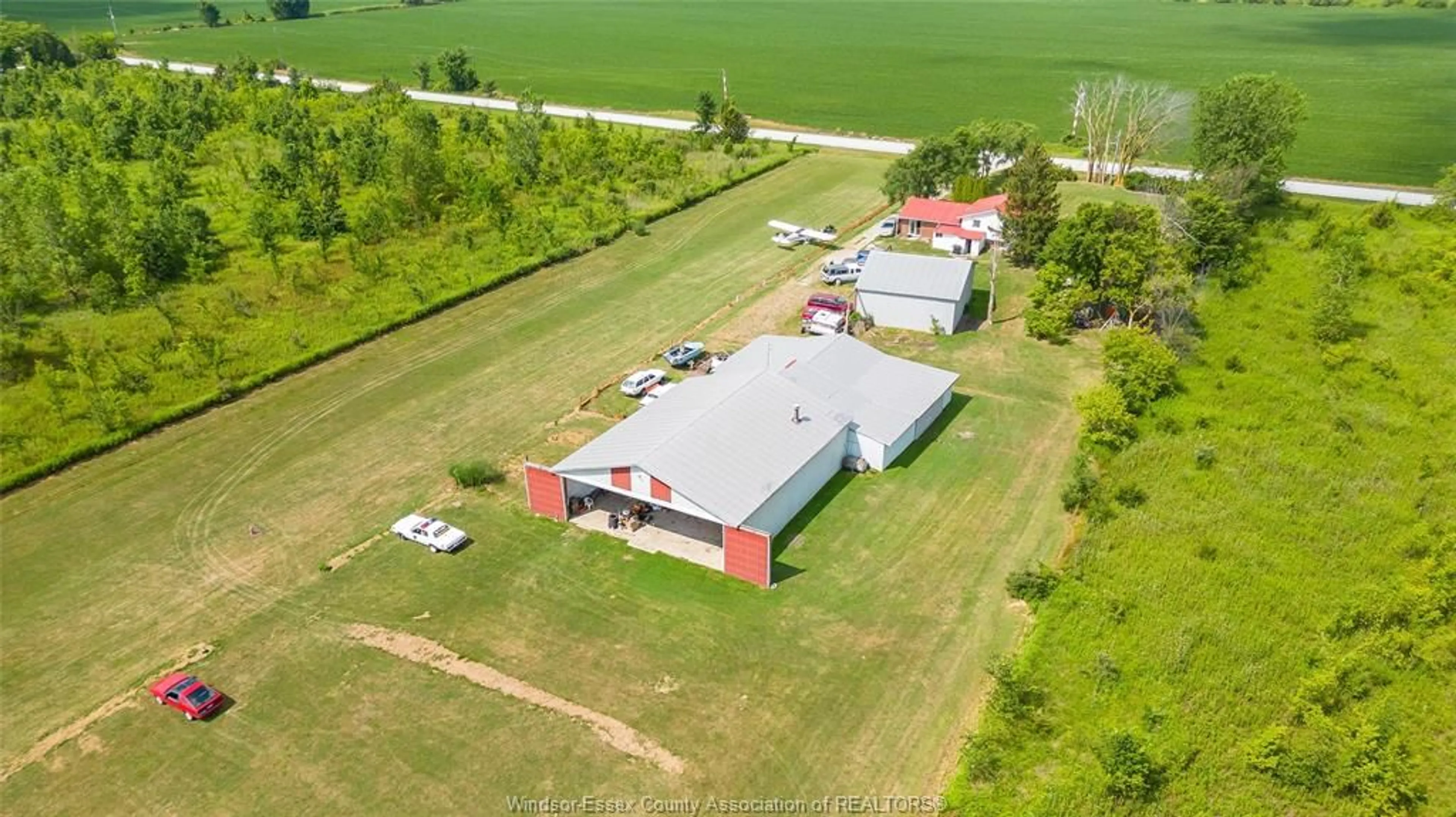 A pic from outside/outdoor area/front of a property/back of a property/a pic from drone, building for 7063 COULTER SIDE Rd, Essex Ontario N0R 1B0