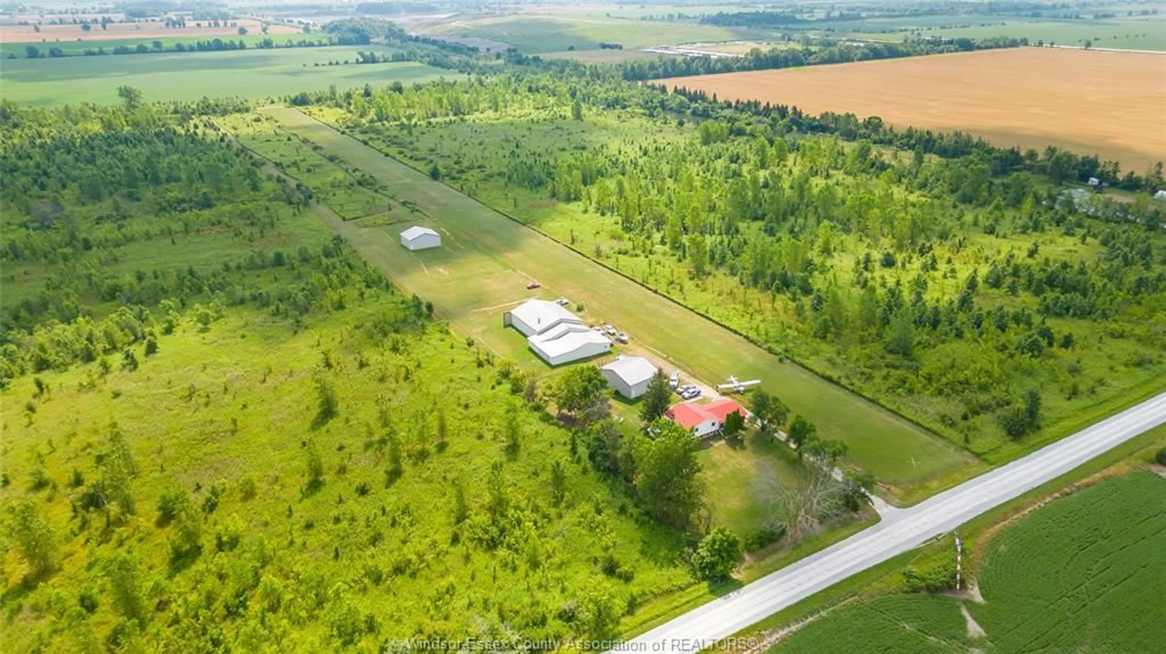 A pic from outside/outdoor area/front of a property/back of a property/a pic from drone, building for 7063 COULTER SIDE Rd, Essex Ontario N0R 1B0