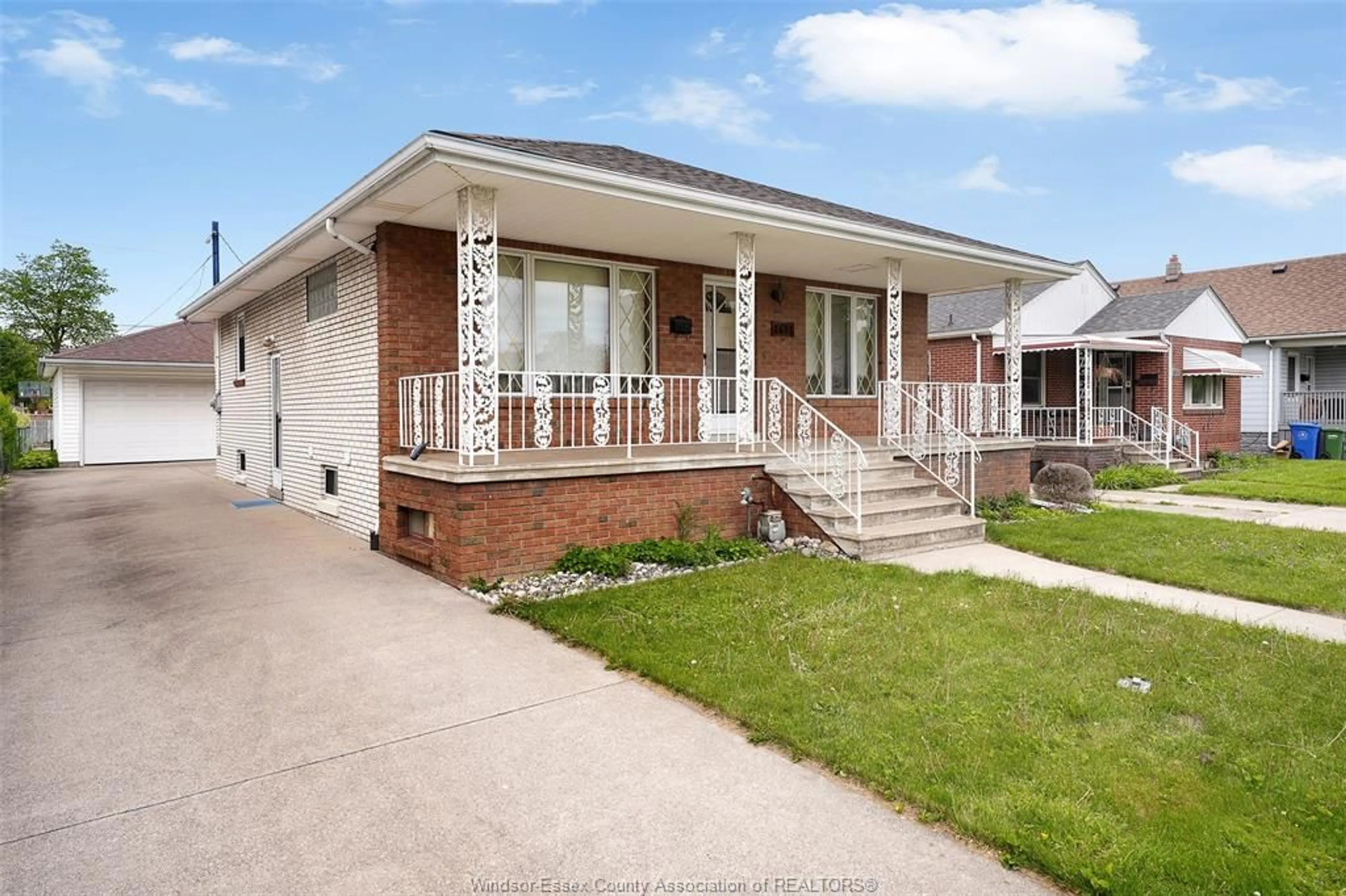 Home with brick exterior material, street for 1639 LANGLOIS Ave, Windsor Ontario N8X 4M4