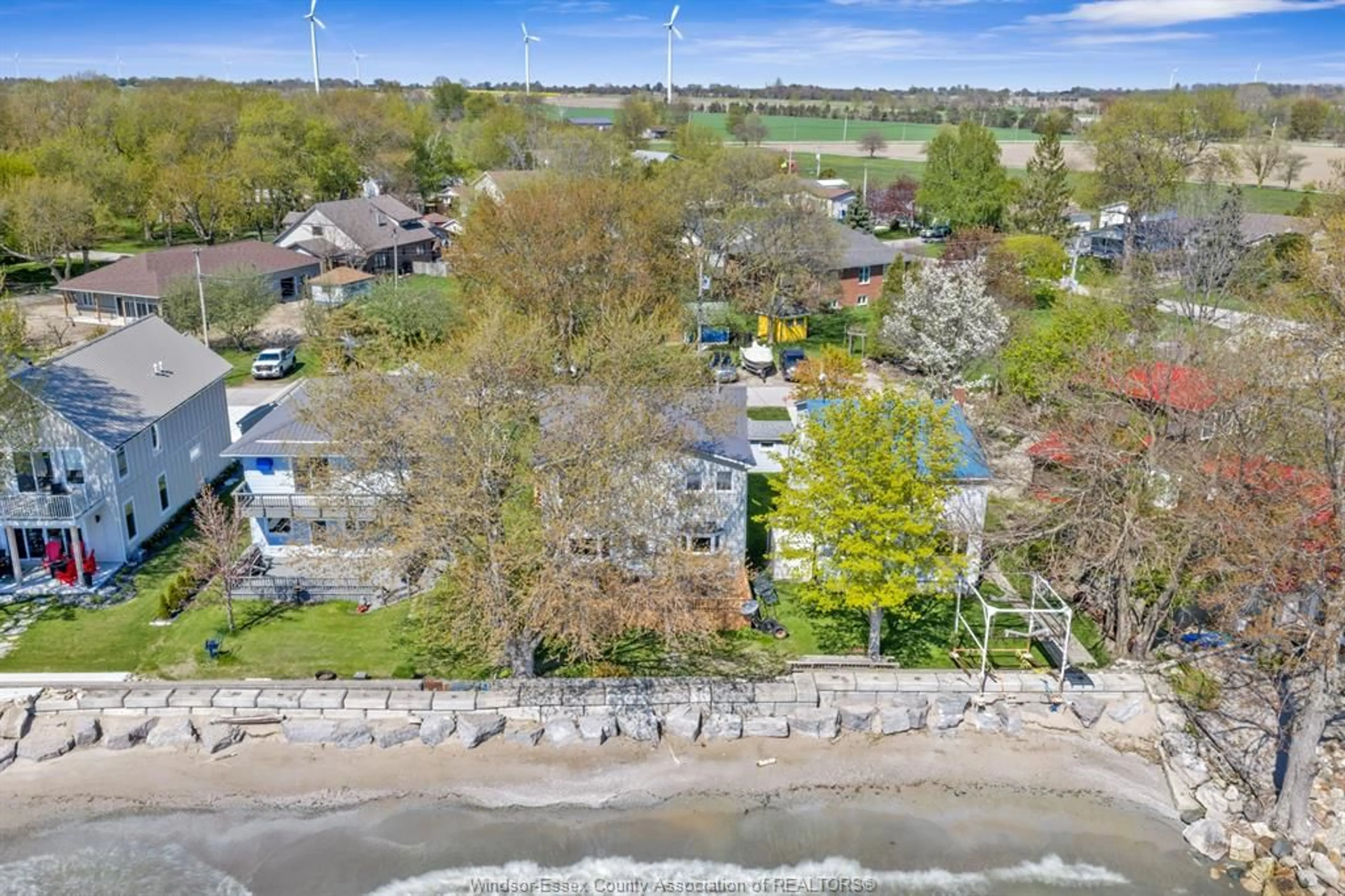 A pic from outside/outdoor area/front of a property/back of a property/a pic from drone, water/lake/river/ocean view for 545 LAKEVIEW Ave, Essex Ontario N0R 1G0