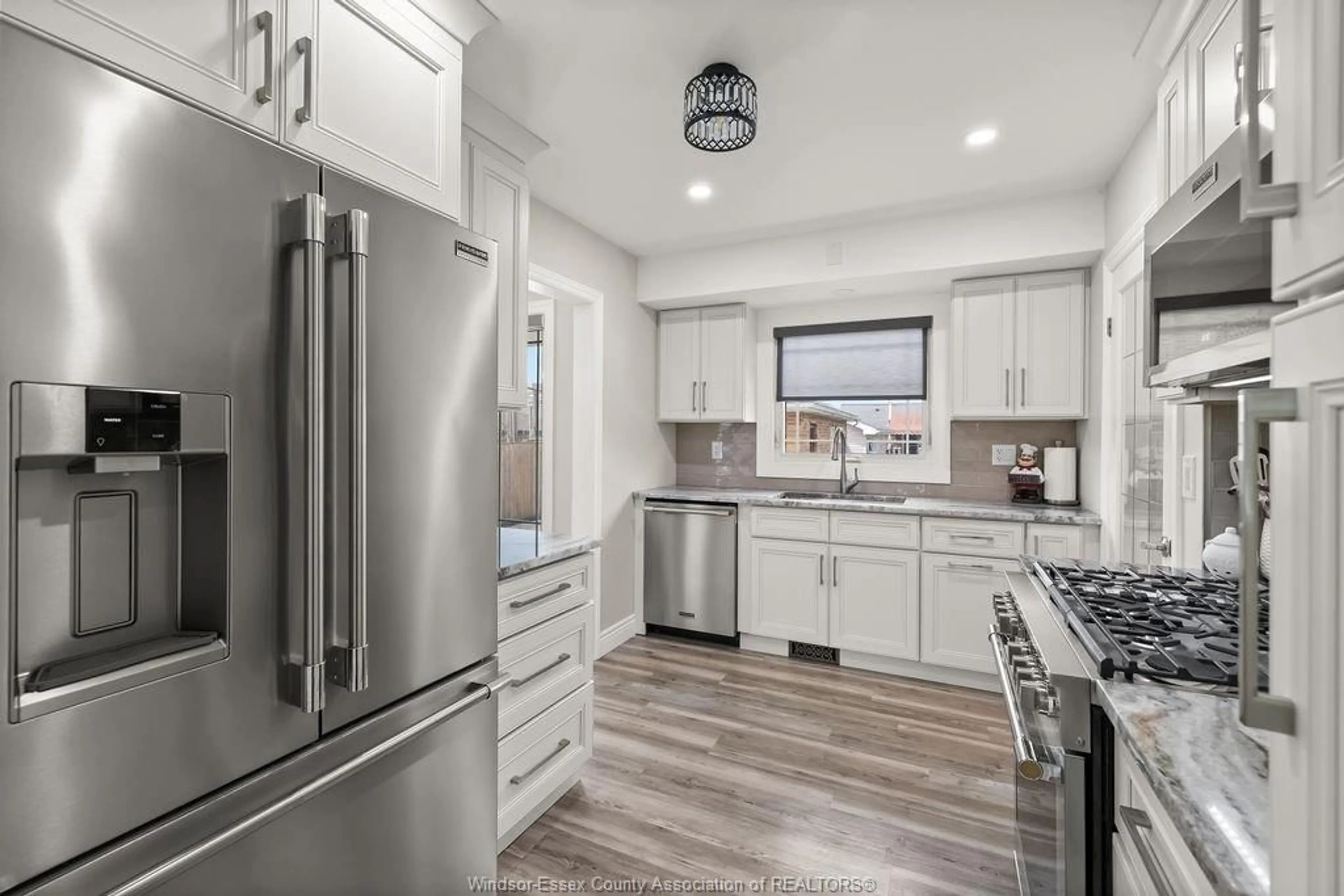 Open concept kitchen, ceramic/tile floor for 3881 MOUNT CARMEL Dr, Windsor Ontario N9G 2C6