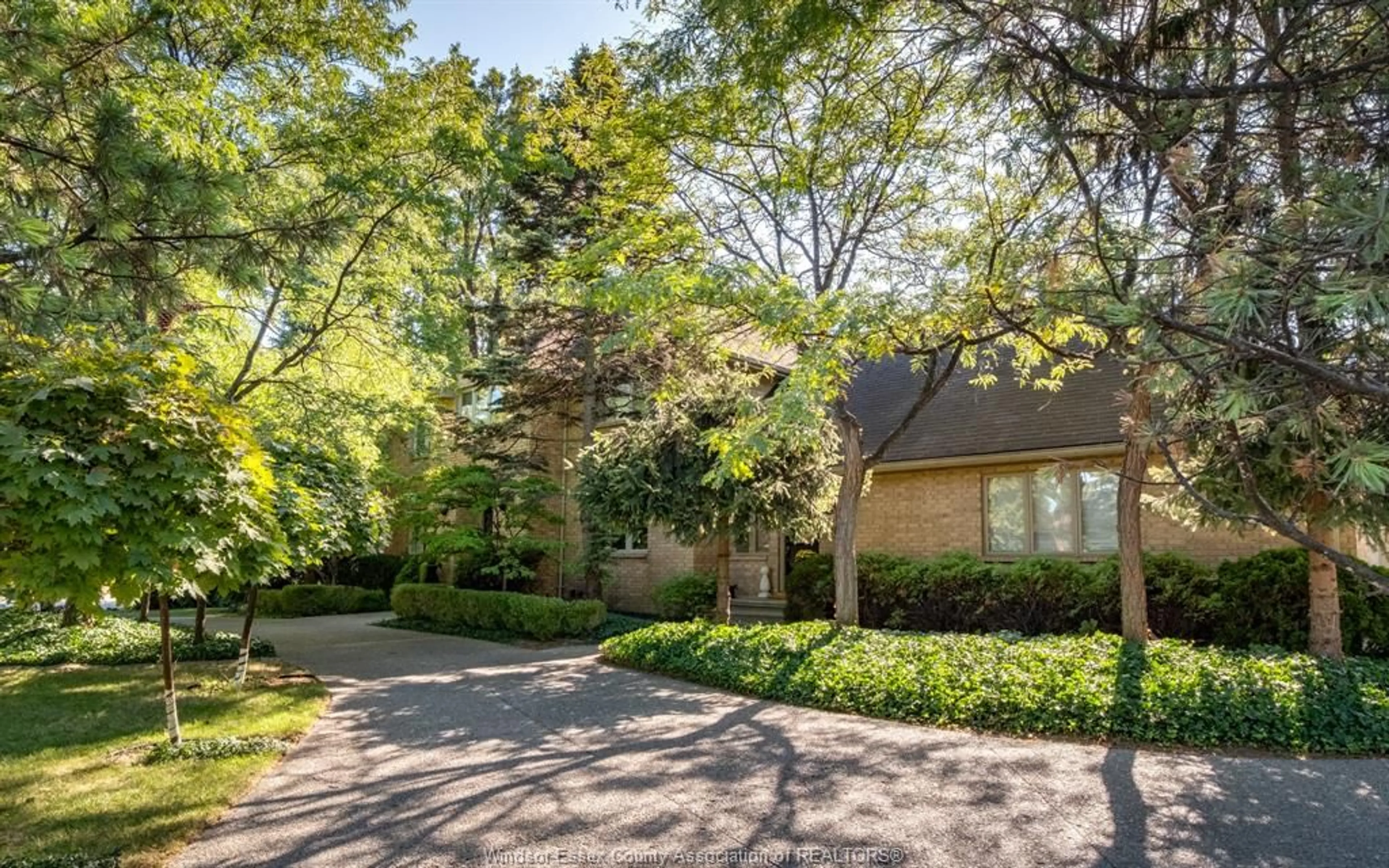Home with brick exterior material, street for 379 ELMGROVE Dr, Lakeshore Ontario N8N 4H2