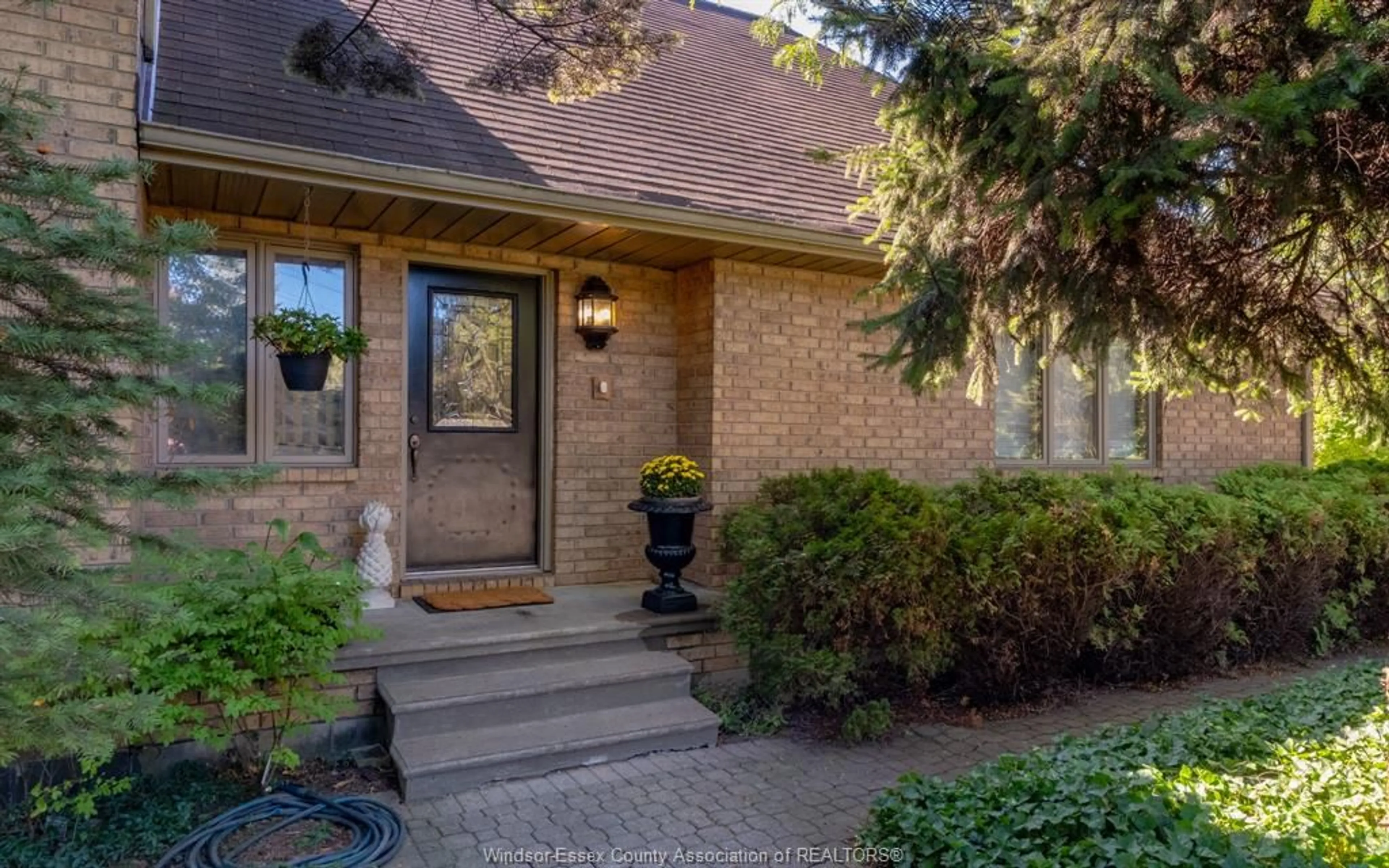 Home with brick exterior material, street for 379 ELMGROVE Dr, Lakeshore Ontario N8N 4H2