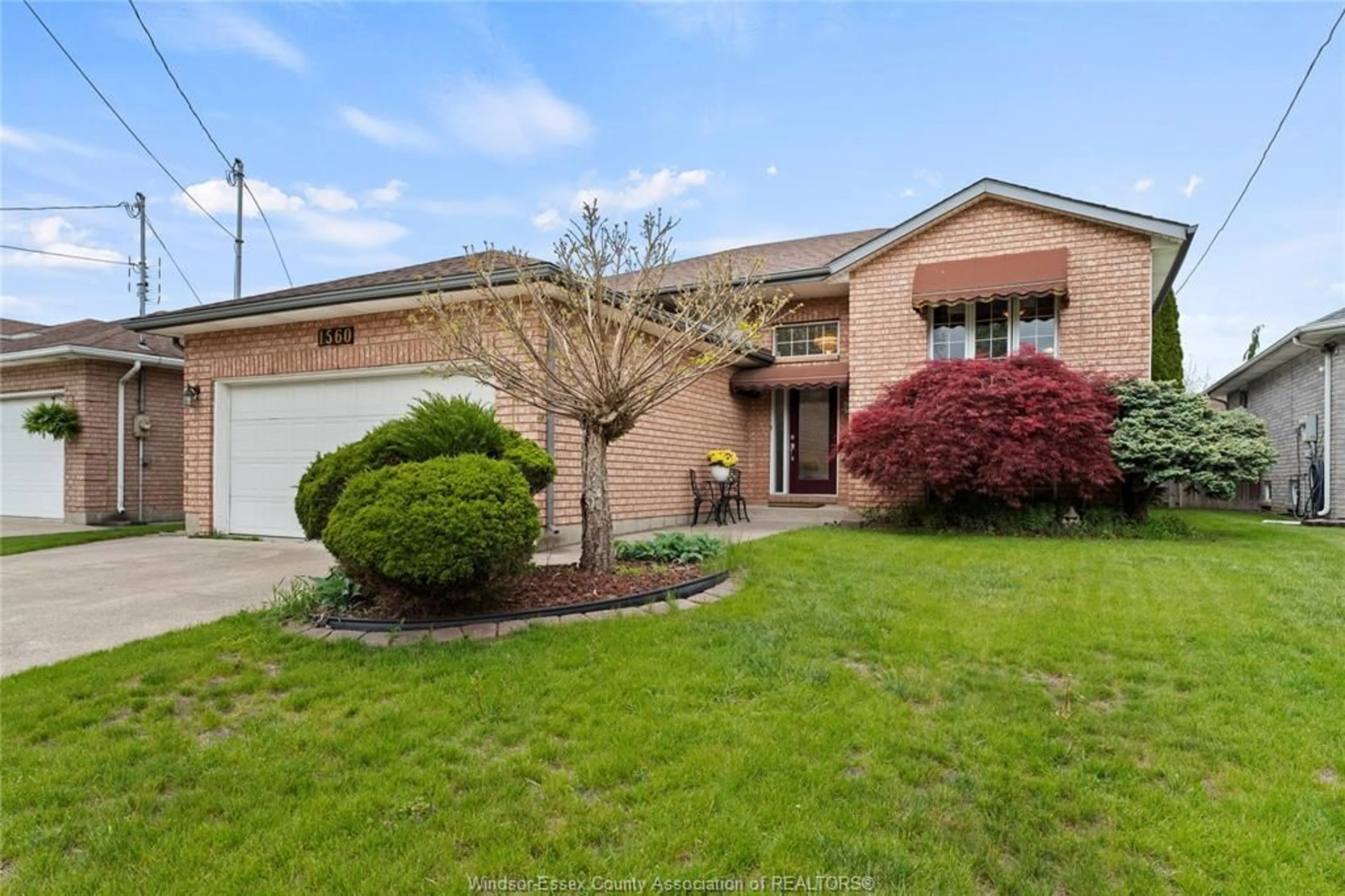 Home with brick exterior material, street for 1560 GRAND MARAIS Rd, Windsor Ontario N8W 1W2