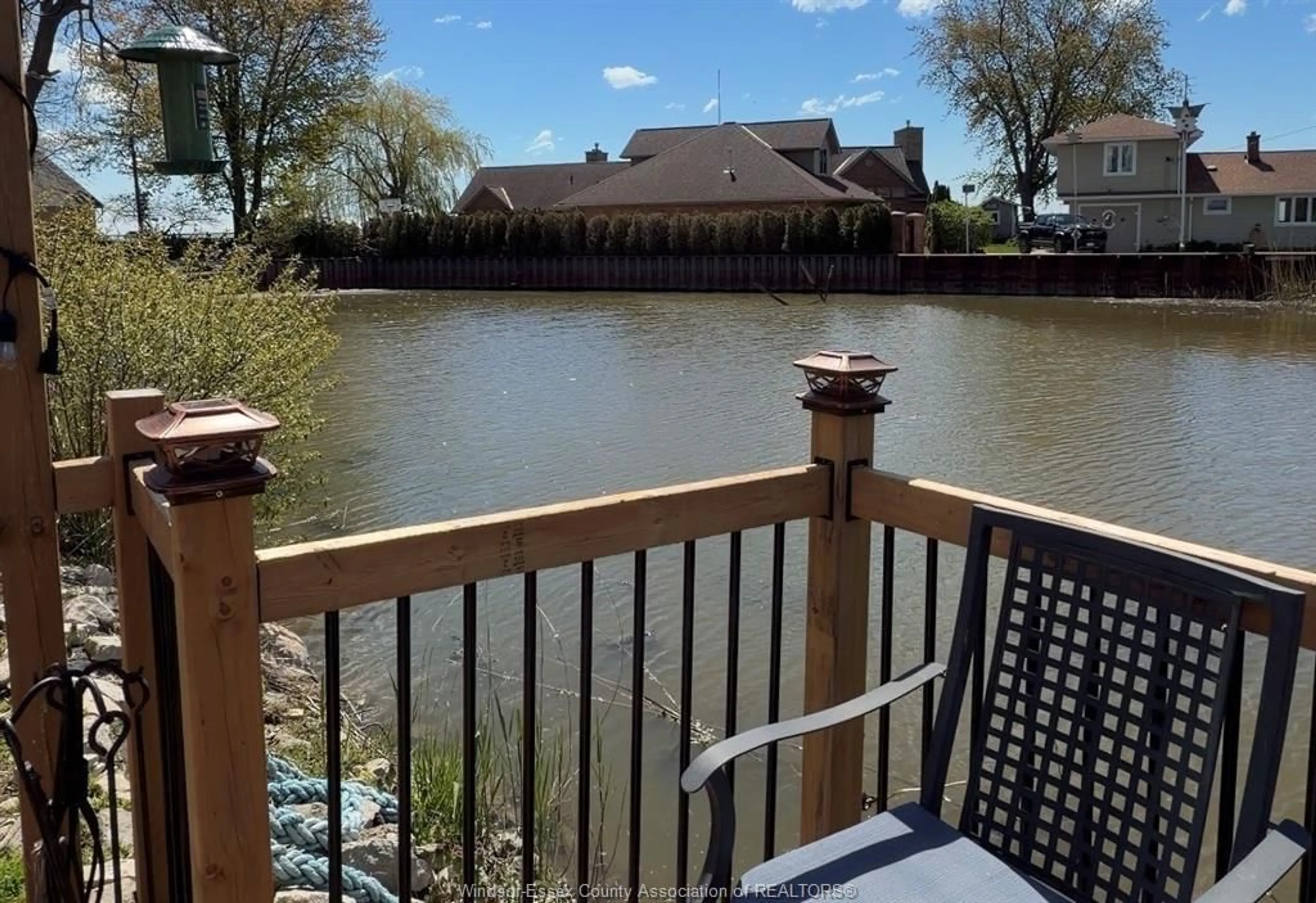A pic from outside/outdoor area/front of a property/back of a property/a pic from drone, water/lake/river/ocean view for 709 HERITAGE Rd #34, Kingsville Ontario N9Y 3B1