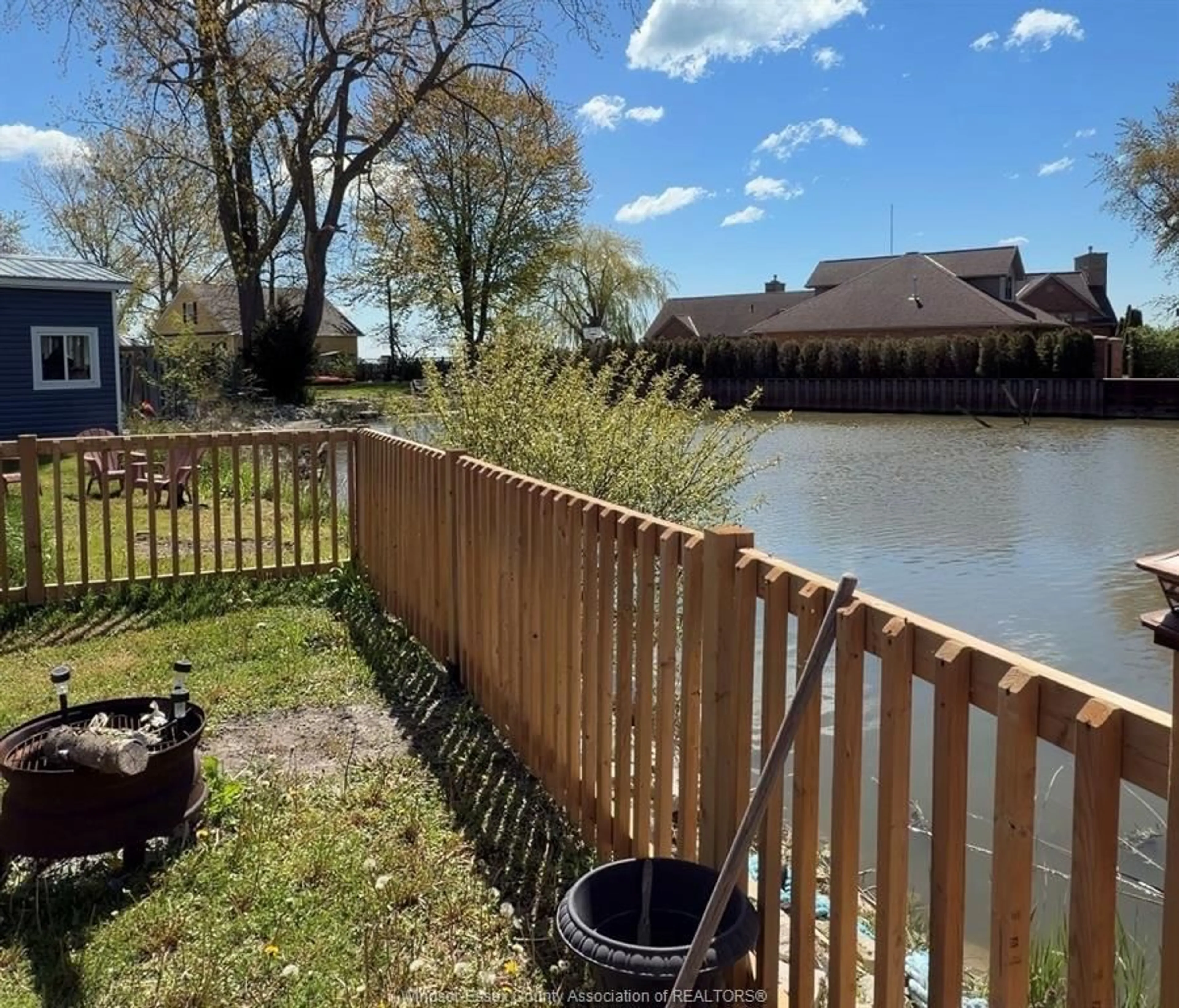 A pic from outside/outdoor area/front of a property/back of a property/a pic from drone, water/lake/river/ocean view for 709 HERITAGE Rd #34, Kingsville Ontario N9Y 3B1