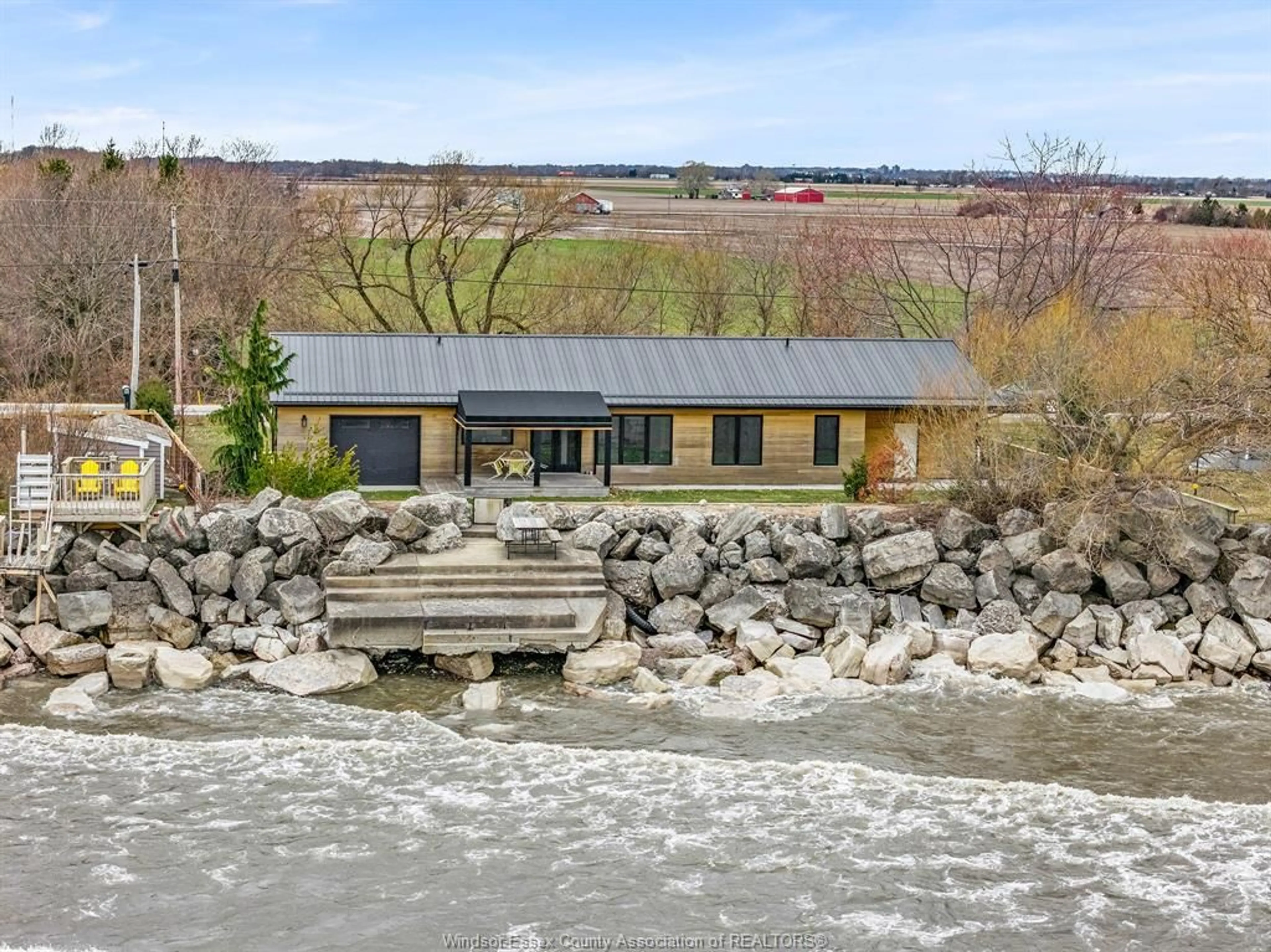 A pic from outside/outdoor area/front of a property/back of a property/a pic from drone, water/lake/river/ocean view for 116 EAST BEACH, Leamington Ontario N8H 3V7