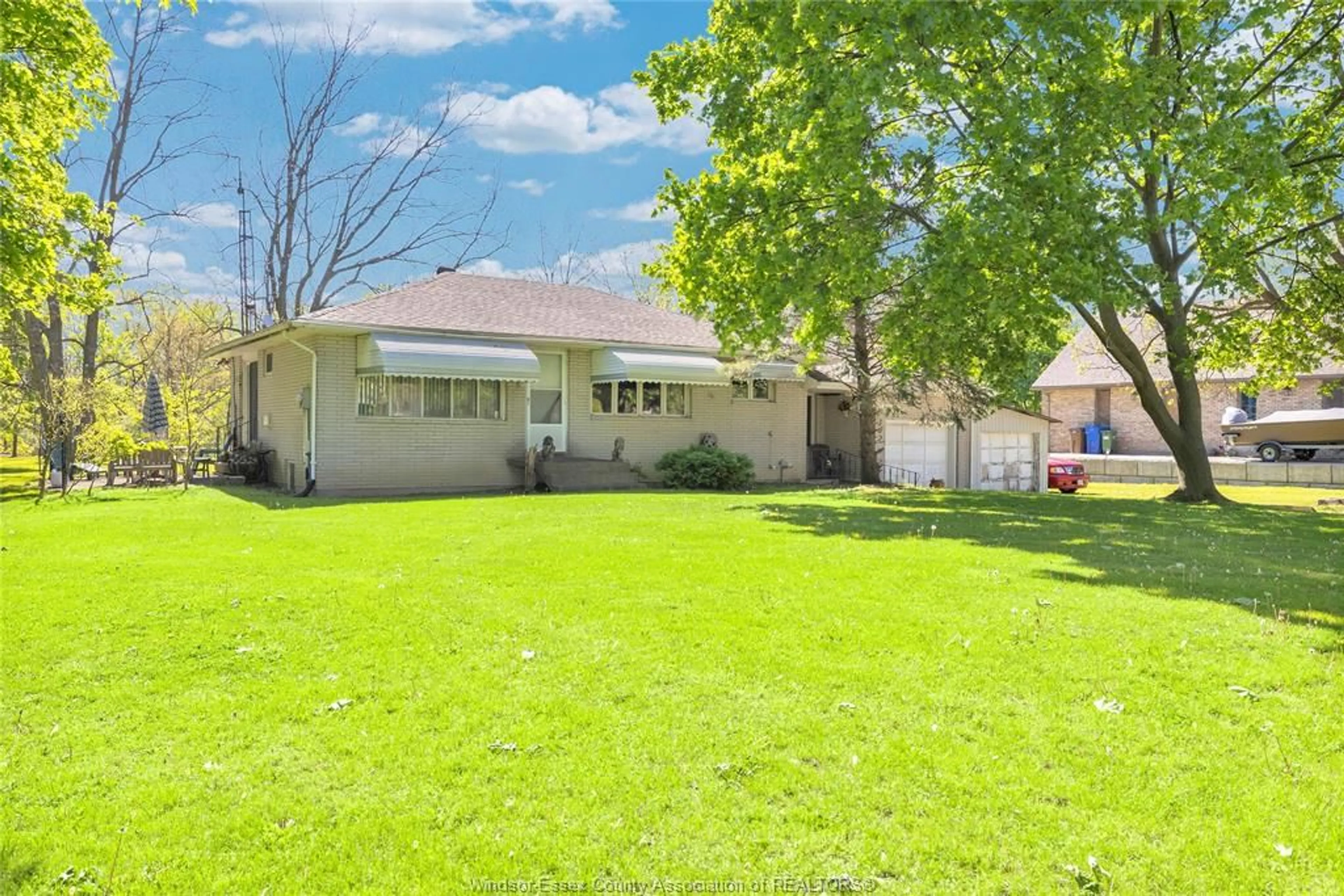 A pic from outside/outdoor area/front of a property/back of a property/a pic from drone, street for 302 WEST PIKE CREEK Rd, Lakeshore Ontario N8N 2L9