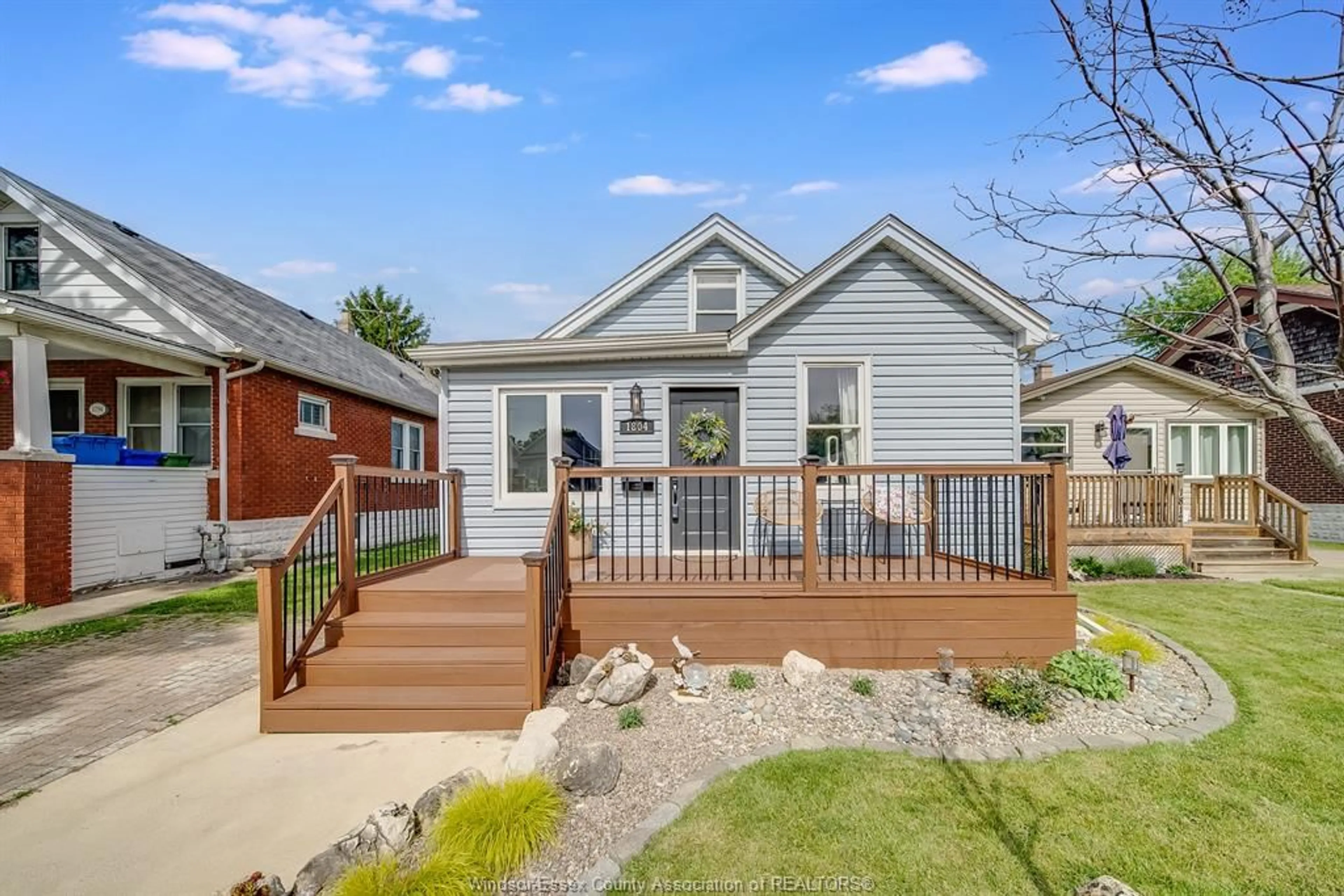 Home with vinyl exterior material, street for 1804 HALL Ave, Windsor Ontario N8W 2L4