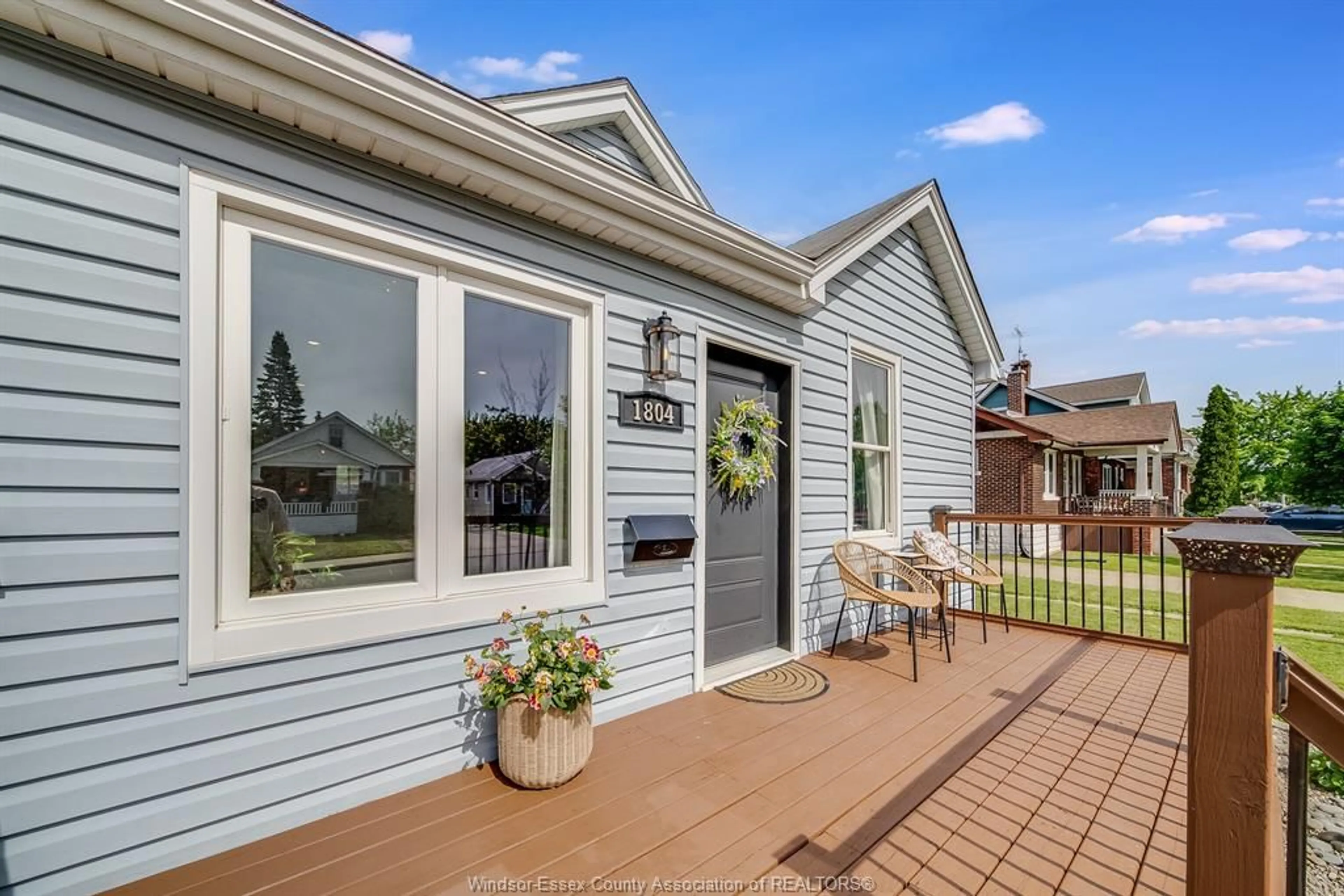 Home with vinyl exterior material, street for 1804 HALL Ave, Windsor Ontario N8W 2L4