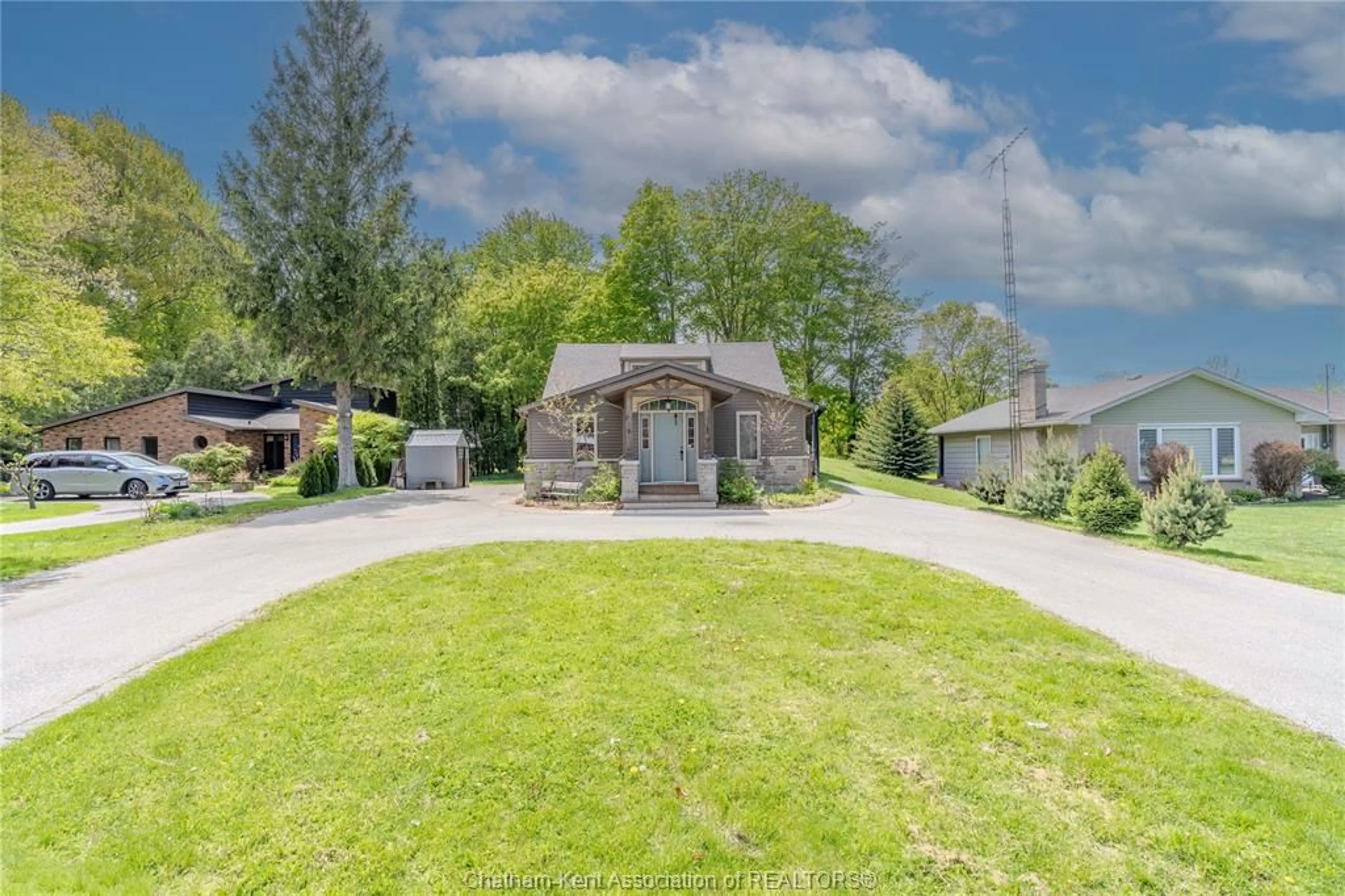 A pic from outside/outdoor area/front of a property/back of a property/a pic from drone, street for 22788 Creek Rd, Chatham Ontario N7M 0L4
