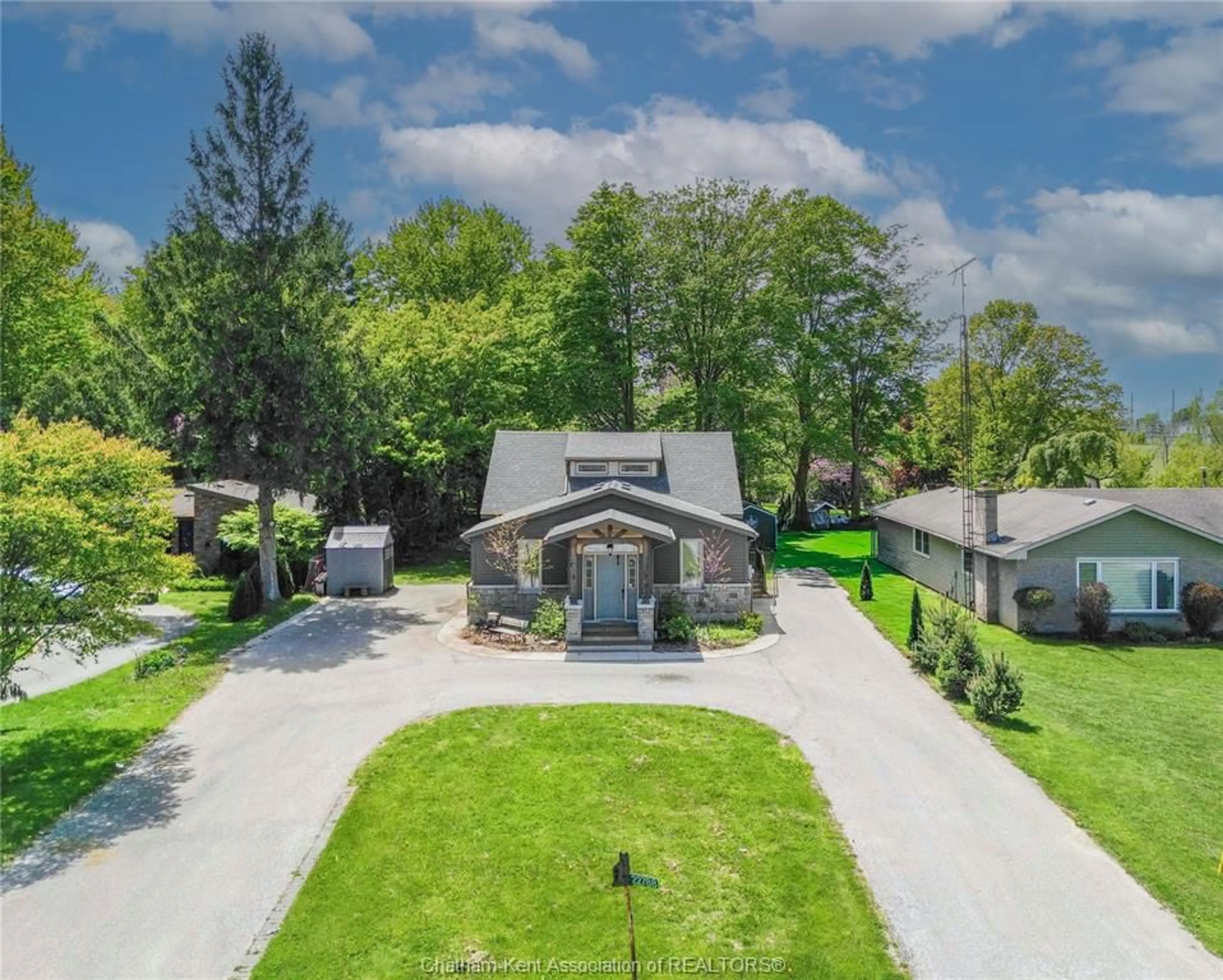 A pic from outside/outdoor area/front of a property/back of a property/a pic from drone, street for 22788 Creek Rd, Chatham Ontario N7M 0L4