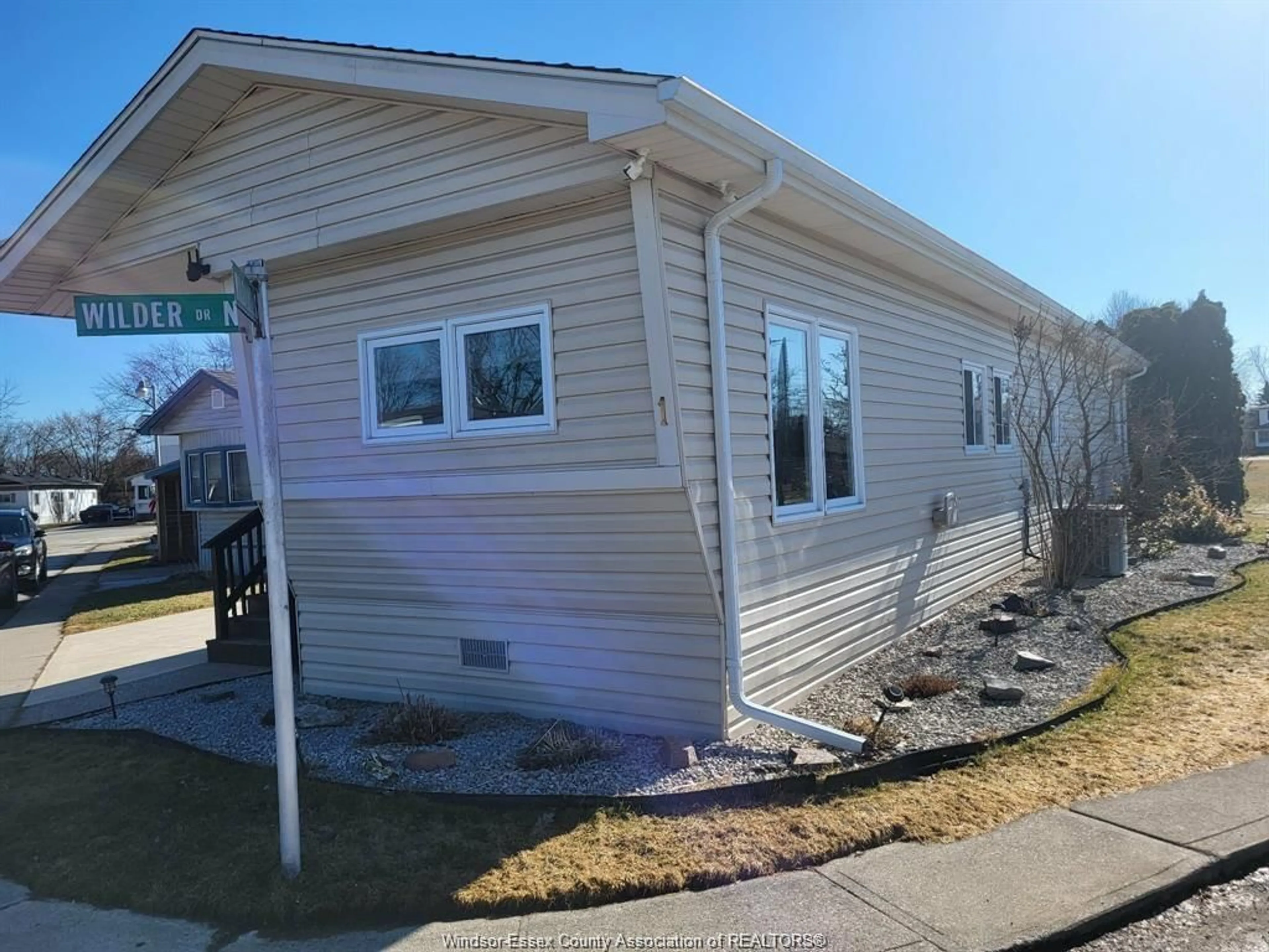 Home with vinyl exterior material, street for 1 WILDER #MOBILE HOME ONLY, Lakeshore Ontario N8N 2S9