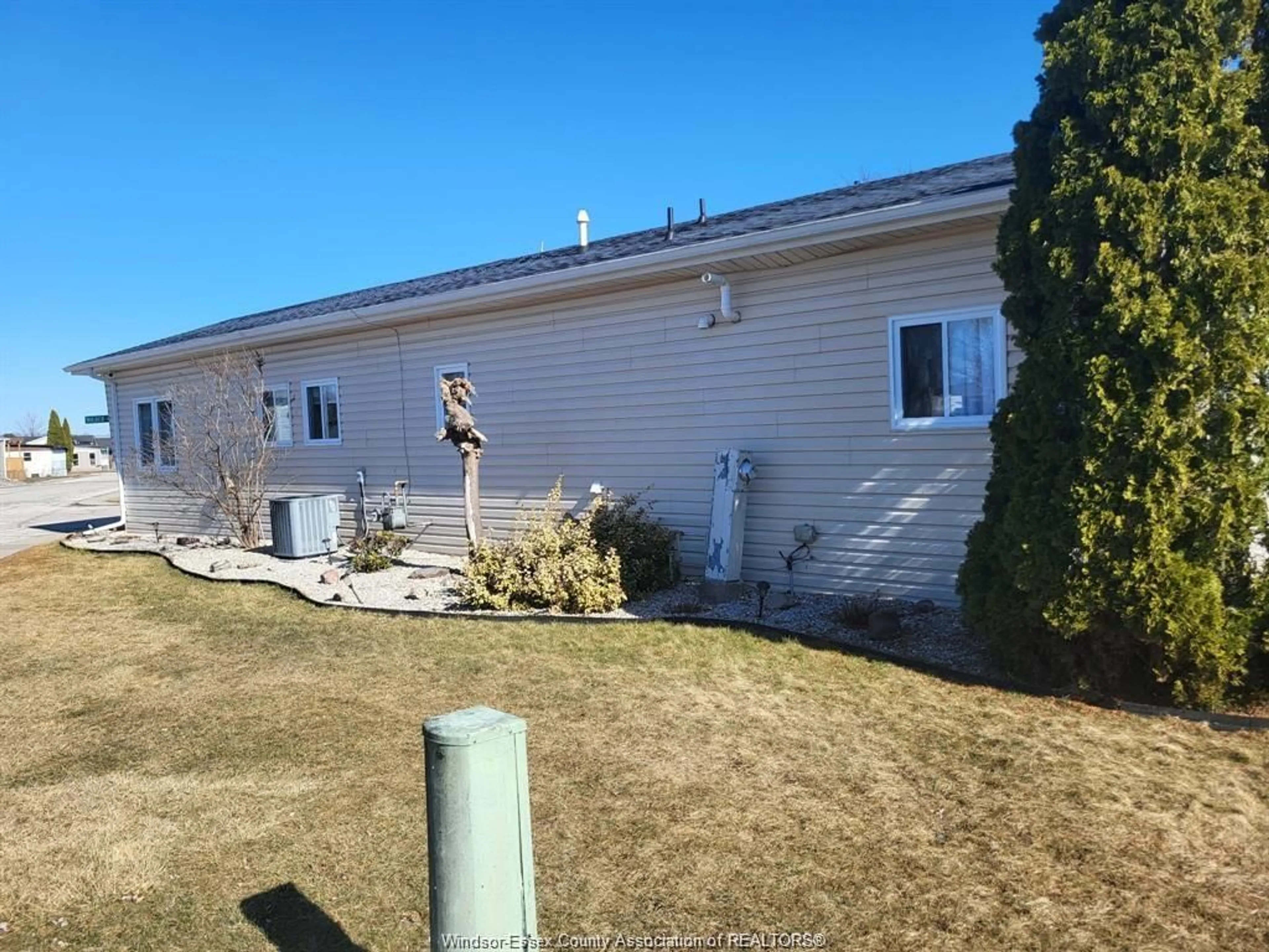 A pic from outside/outdoor area/front of a property/back of a property/a pic from drone, water/lake/river/ocean view for 1 WILDER #MOBILE HOME ONLY, Lakeshore Ontario N8N 2S9