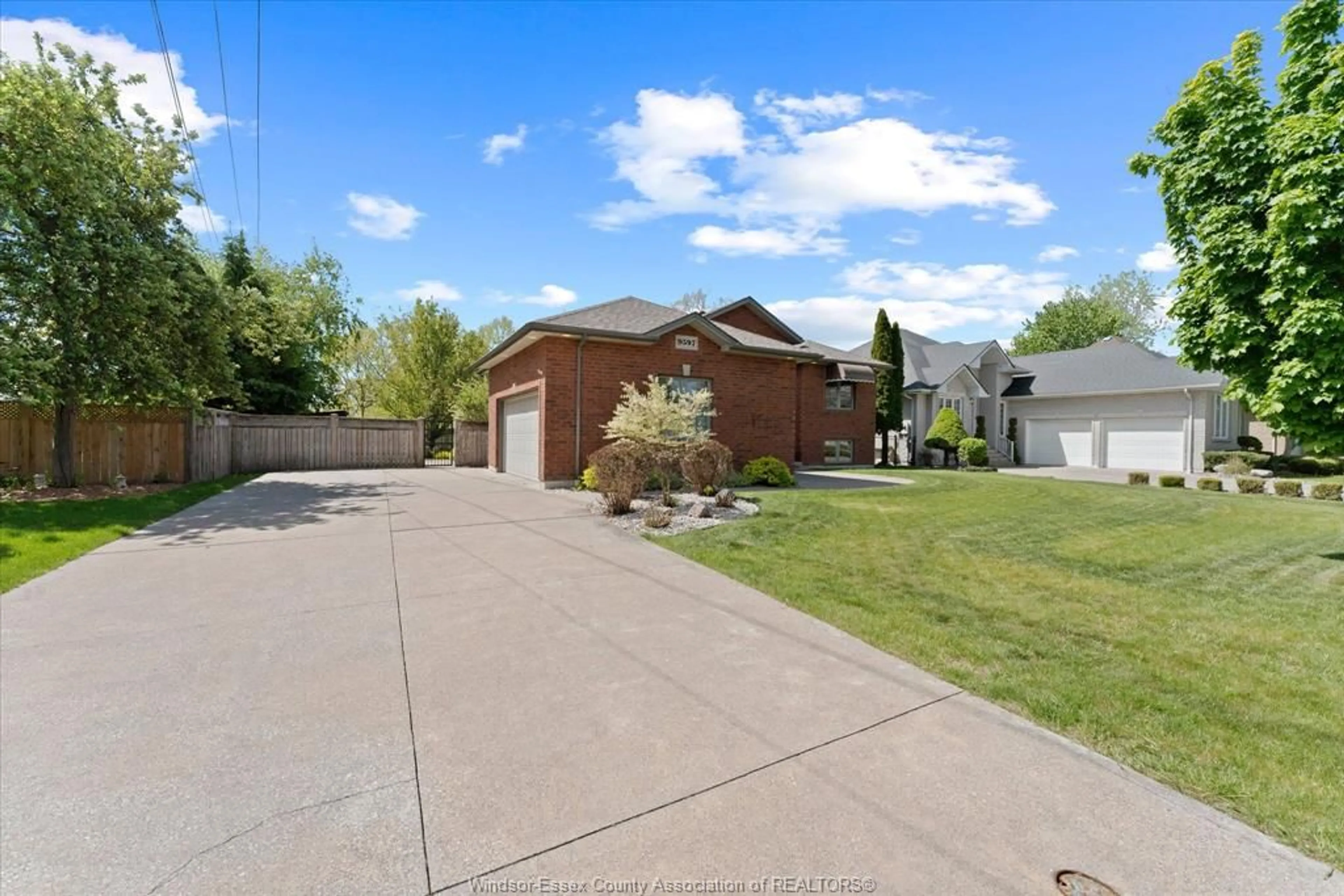 A pic from outside/outdoor area/front of a property/back of a property/a pic from drone, street for 9597 MANITOU Cres, Windsor Ontario N8P 1H8