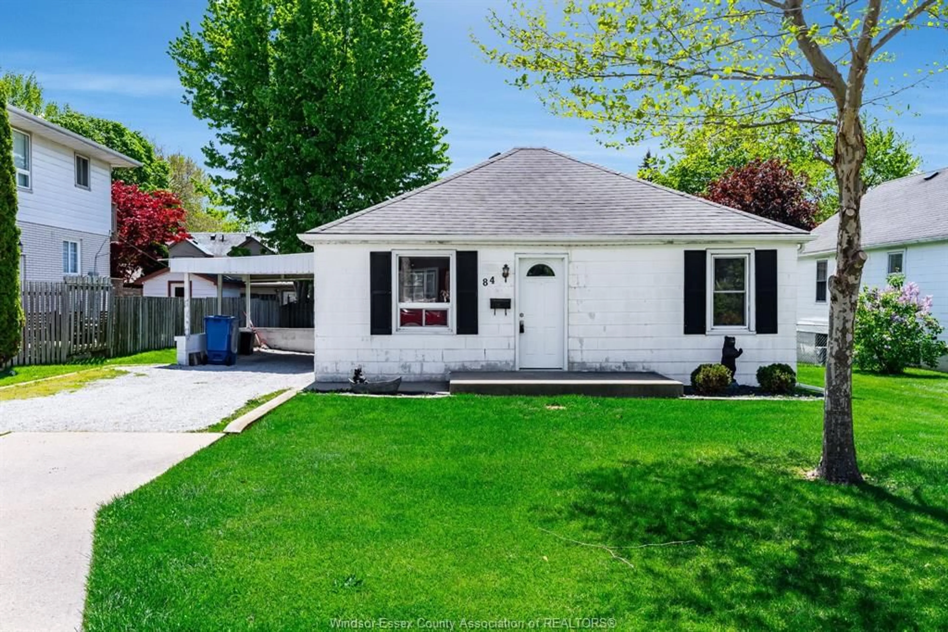 Home with vinyl exterior material, street for 84 Robinson St, Leamington Ontario N8H 1Z4