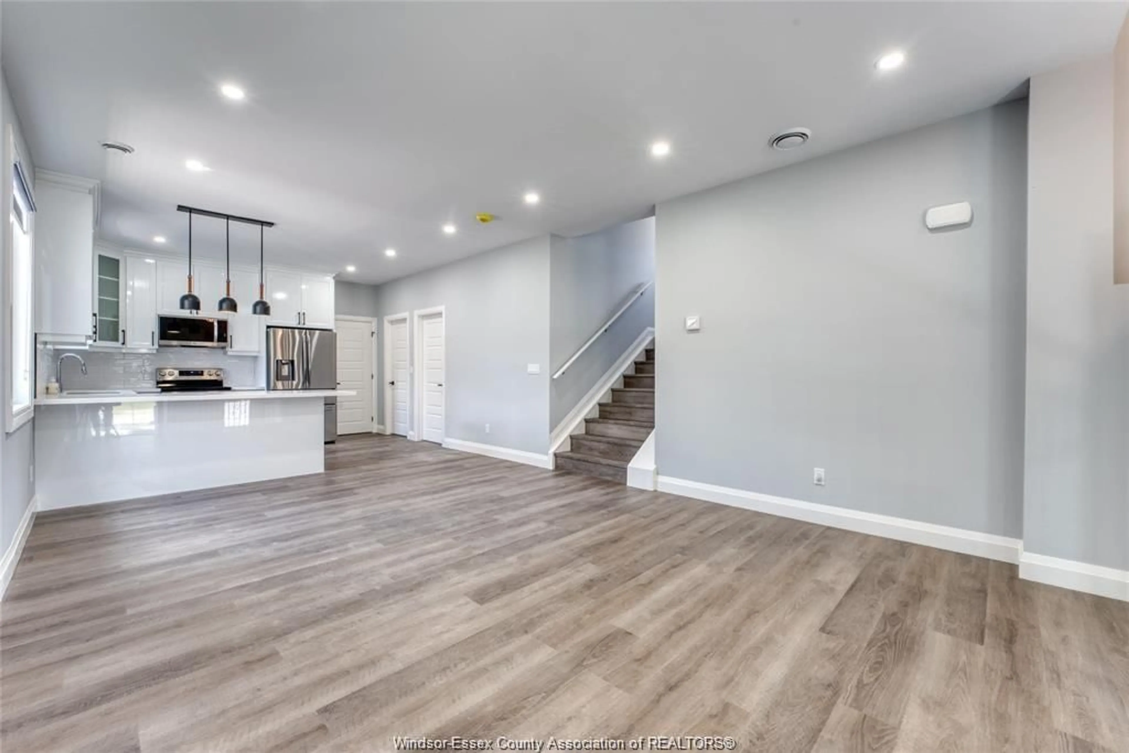 Open concept kitchen, wood/laminate floor for 762 SOUTH PACIFIC Ave, Windsor Ontario N8X 2X2