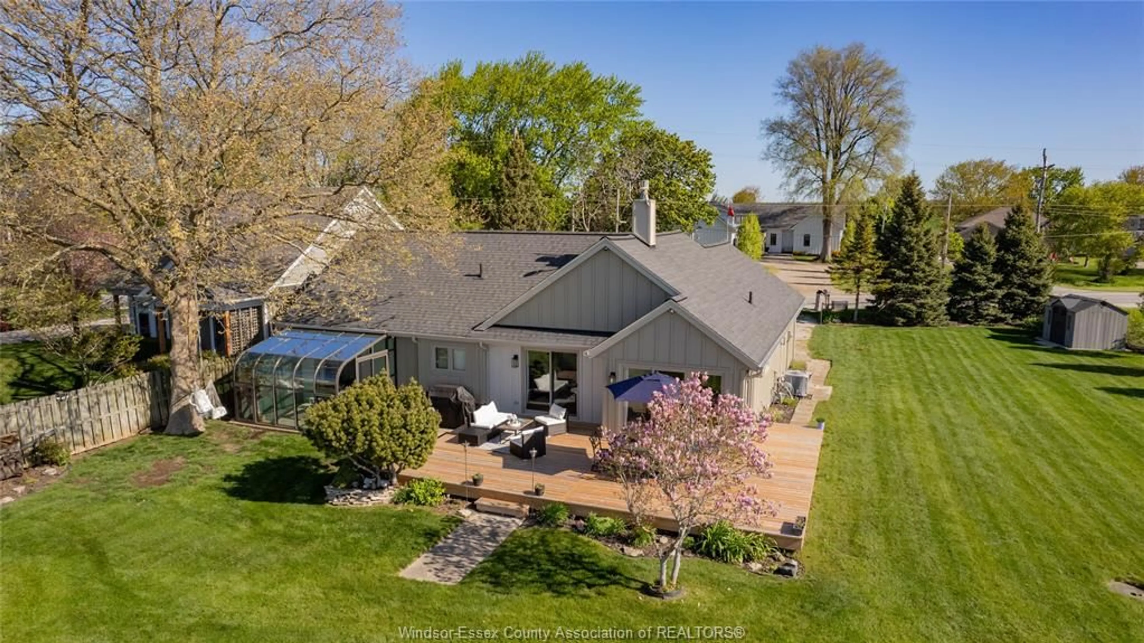 A pic from outside/outdoor area/front of a property/back of a property/a pic from drone, street for 1603 Heritage Rd, Kingsville Ontario N9Y 2E6