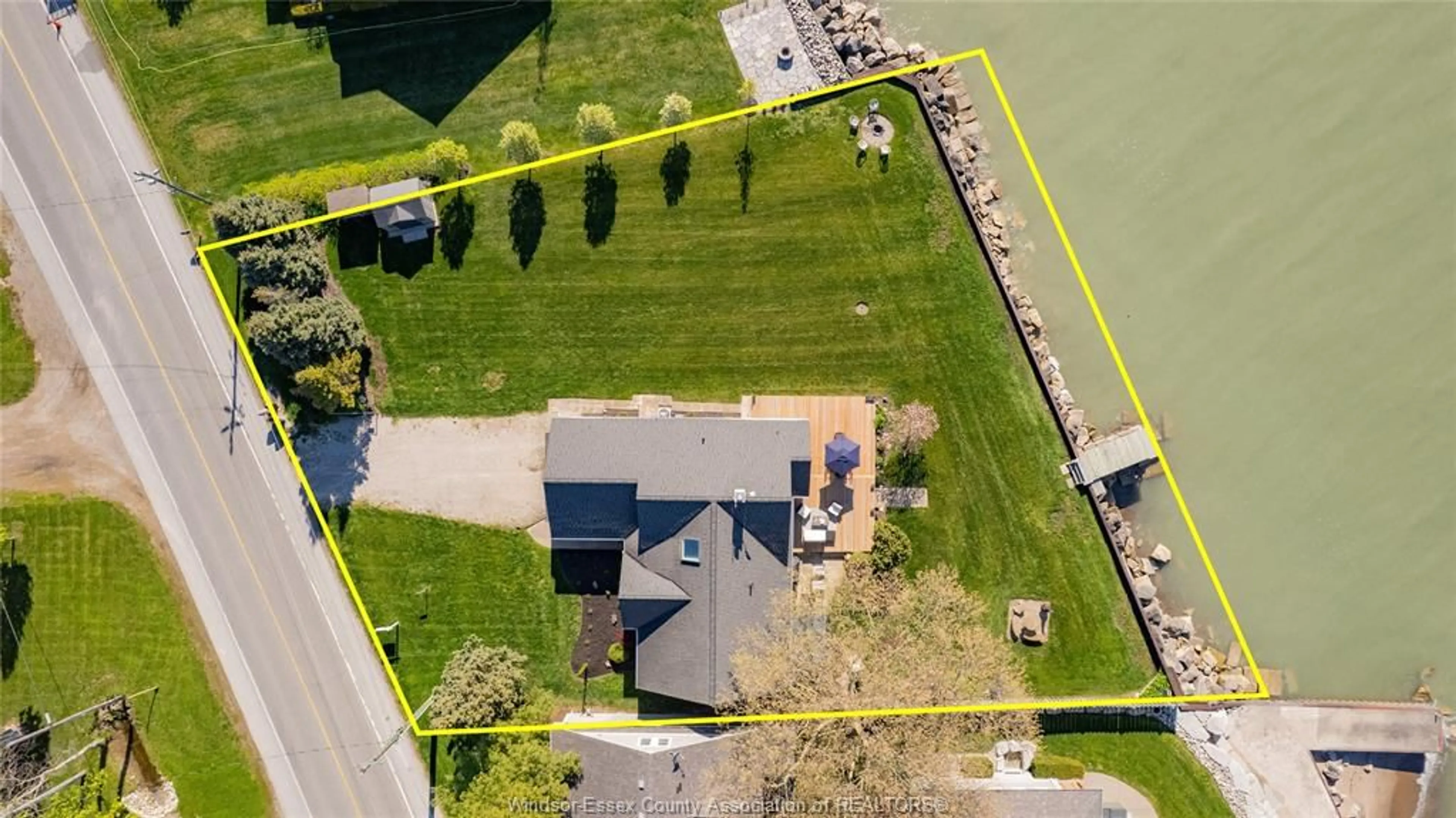 A pic from outside/outdoor area/front of a property/back of a property/a pic from drone, water/lake/river/ocean view for 1603 Heritage Rd, Kingsville Ontario N9Y 2E6
