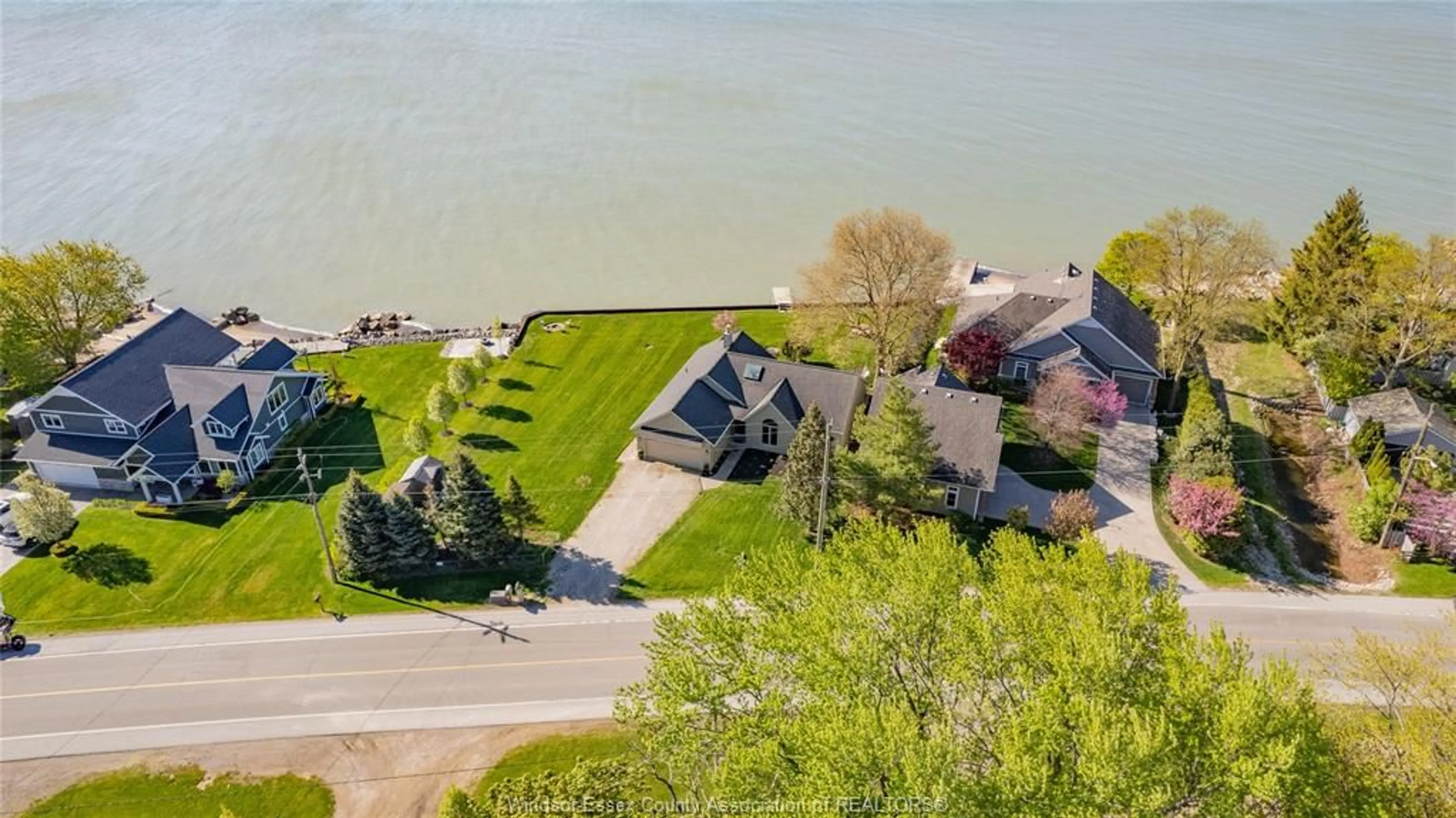 A pic from outside/outdoor area/front of a property/back of a property/a pic from drone, water/lake/river/ocean view for 1603 Heritage Rd, Kingsville Ontario N9Y 2E6