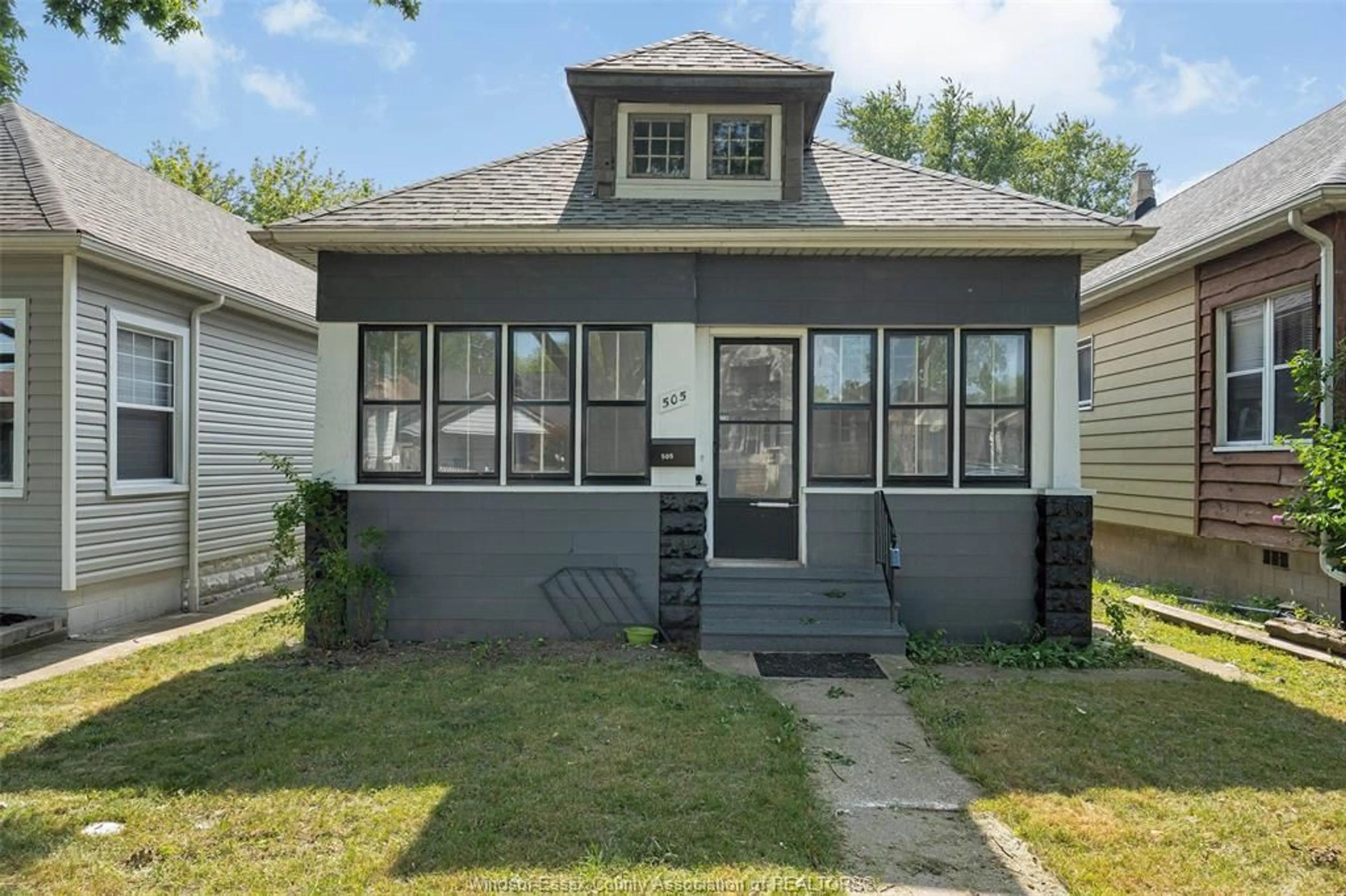 Home with vinyl exterior material, street for 505 MCKAY, Windsor Ontario N9B 1Z7